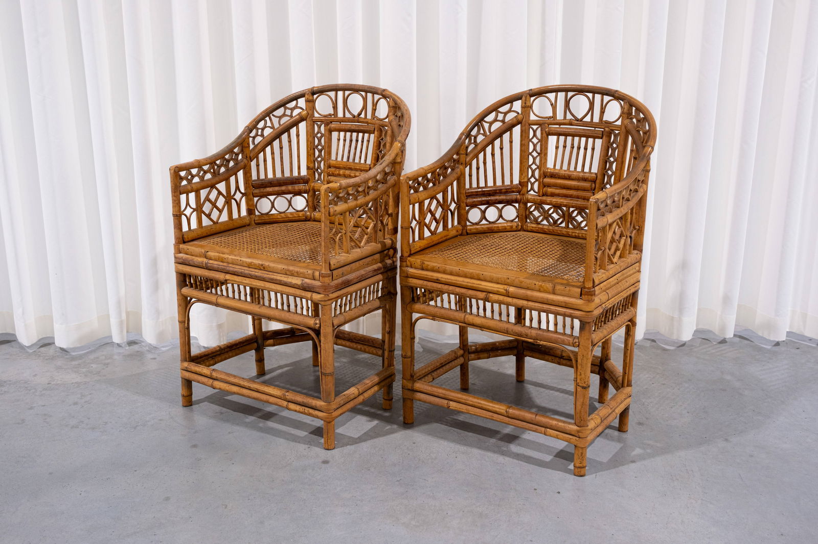 A pair of vintage 'Brighton Pavilion' style bamboo and rattan armchairs (1 of 6)