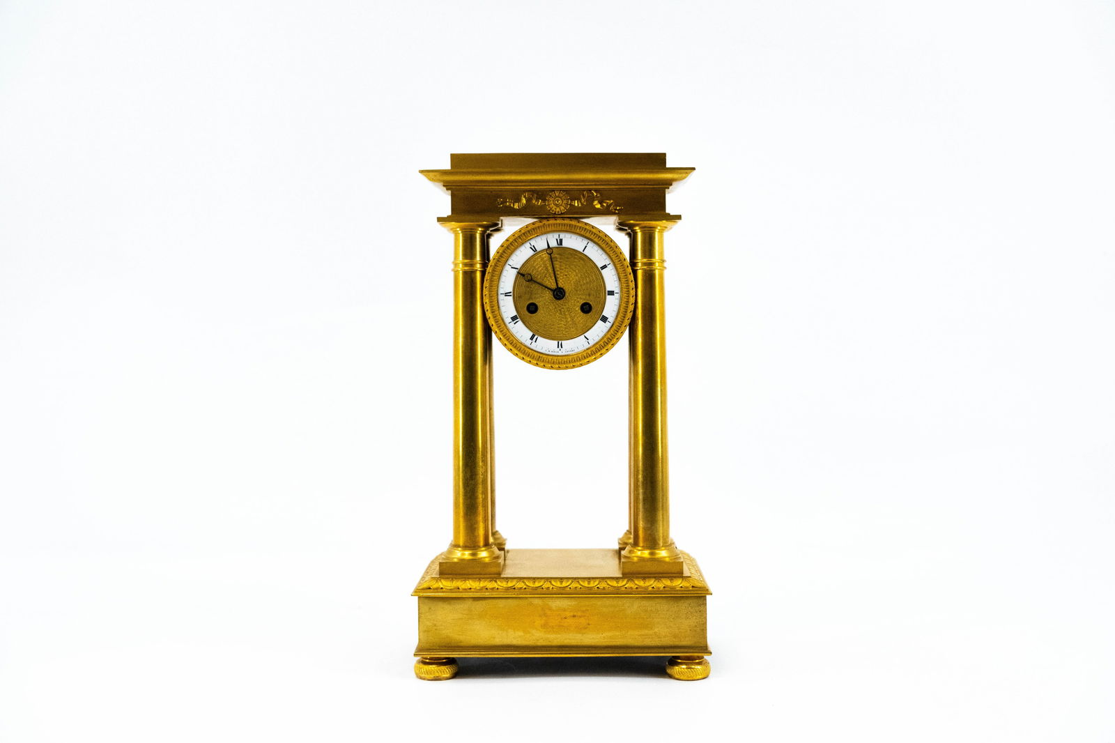 An antique gilt bronze Empire style column mantel clock (1 of 10)