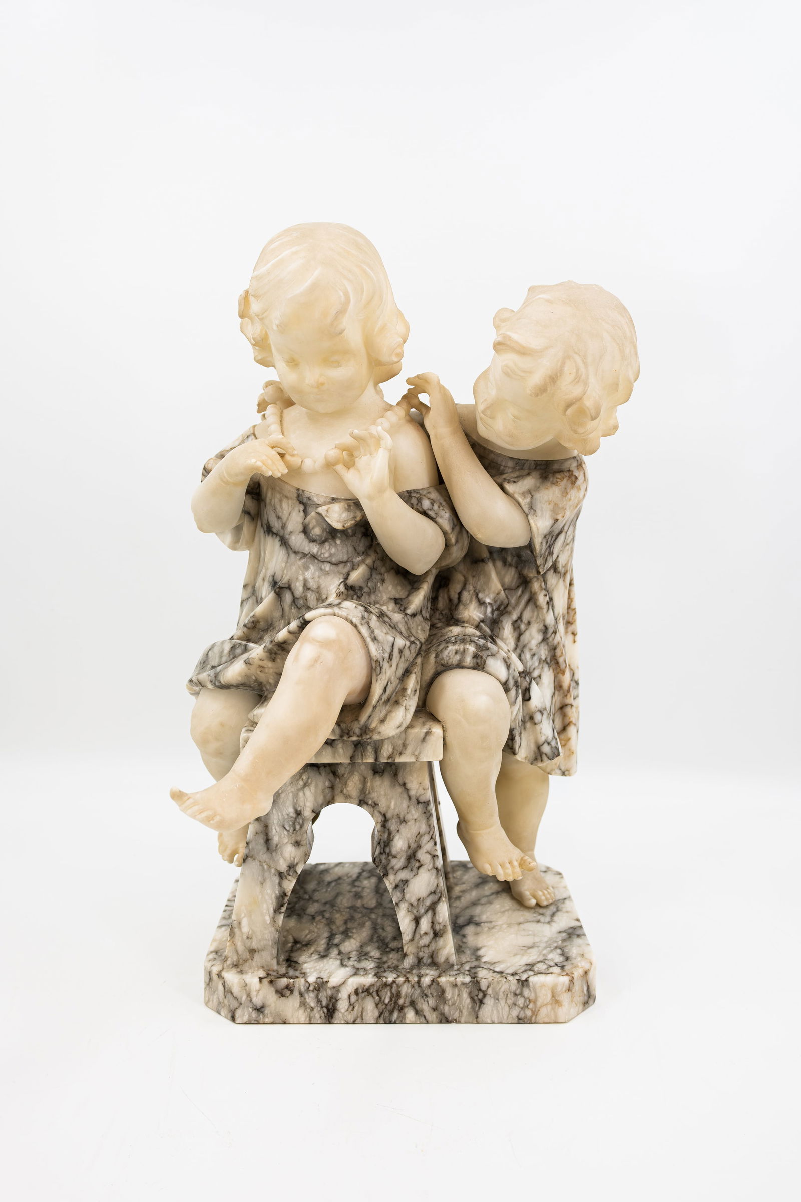 A large and antique carved alabaster sculpture representing a charming scene (1 of 16)