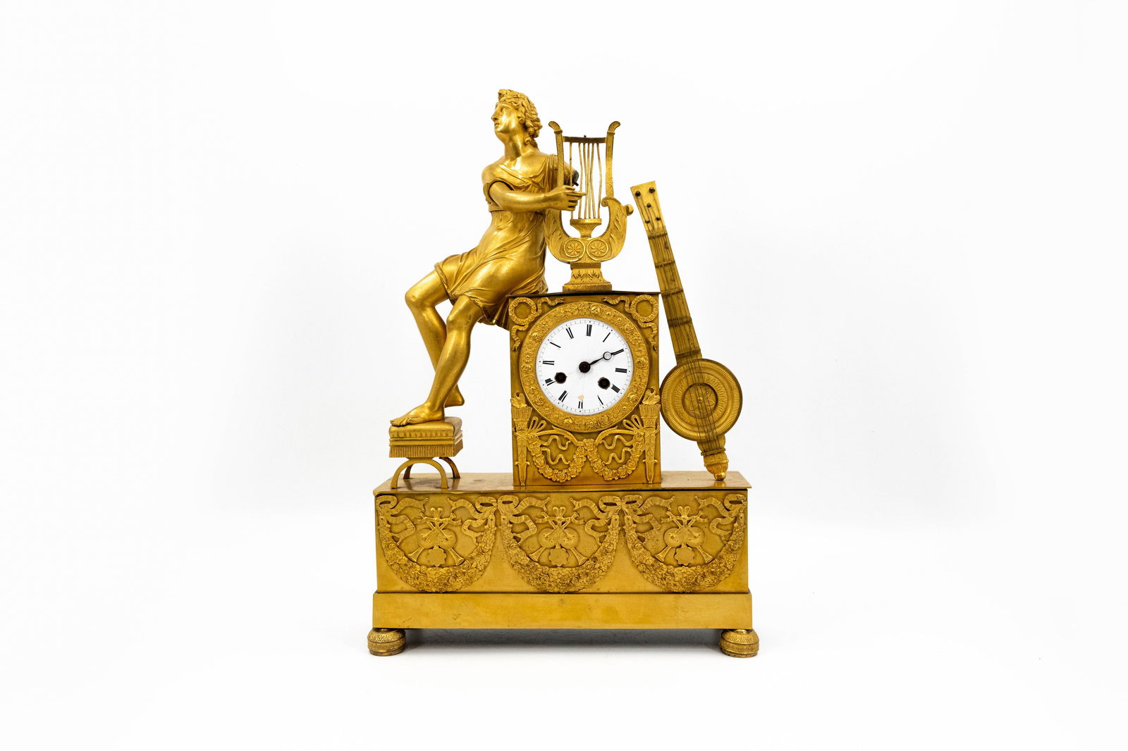 A French antique gilt bronze Empire figural mantel clock representing allegory of music (1 of 15)