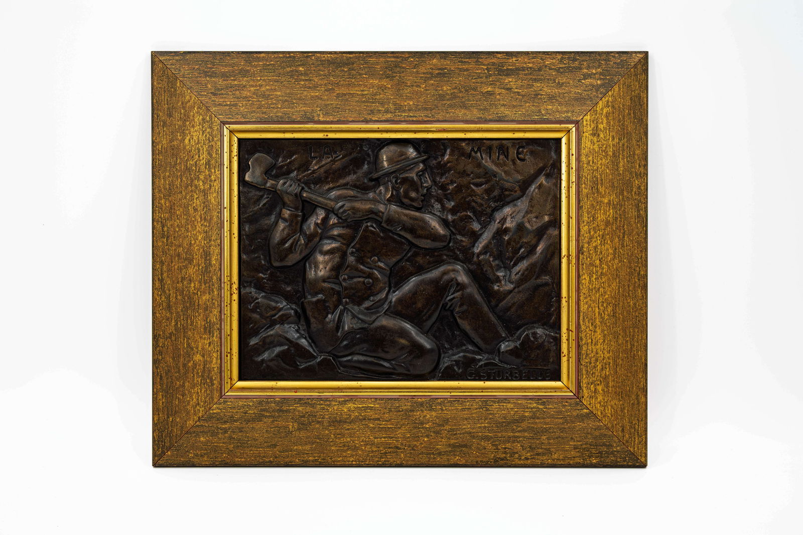 Camille Marc STURBELLE (1873-1930) "La Mine". A patinated bronze bas-relief plaque: Camille Marc STURBELLE (1873-1930) "La Mine". A framed patinated bronze bas-relief plaque. Signed, circa 1900. H: 24 - W: 30 cm