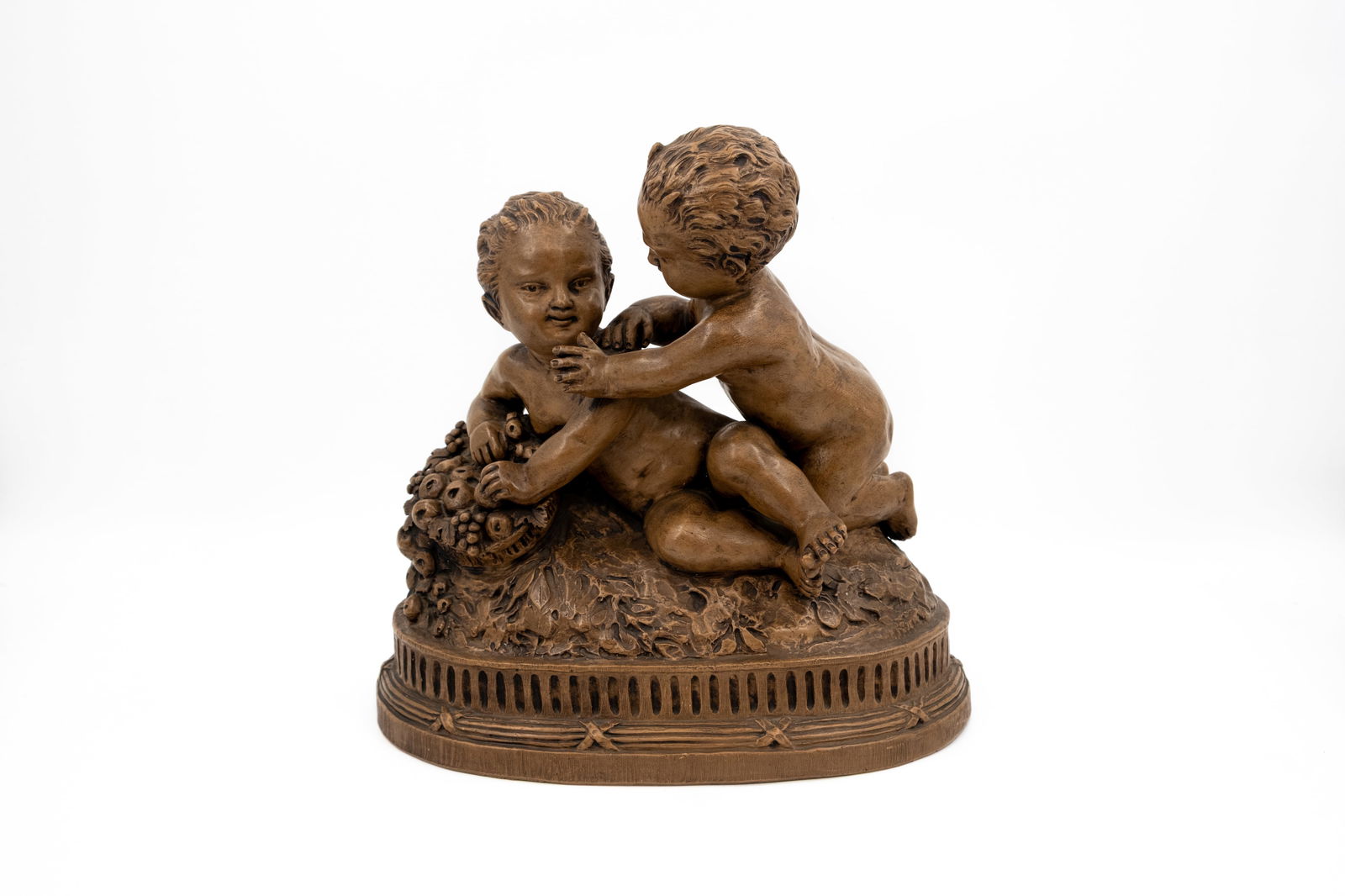 After Claude CLODION (1738-1814) A patinated figural terra cotta group representing two cherub (1 of 10)