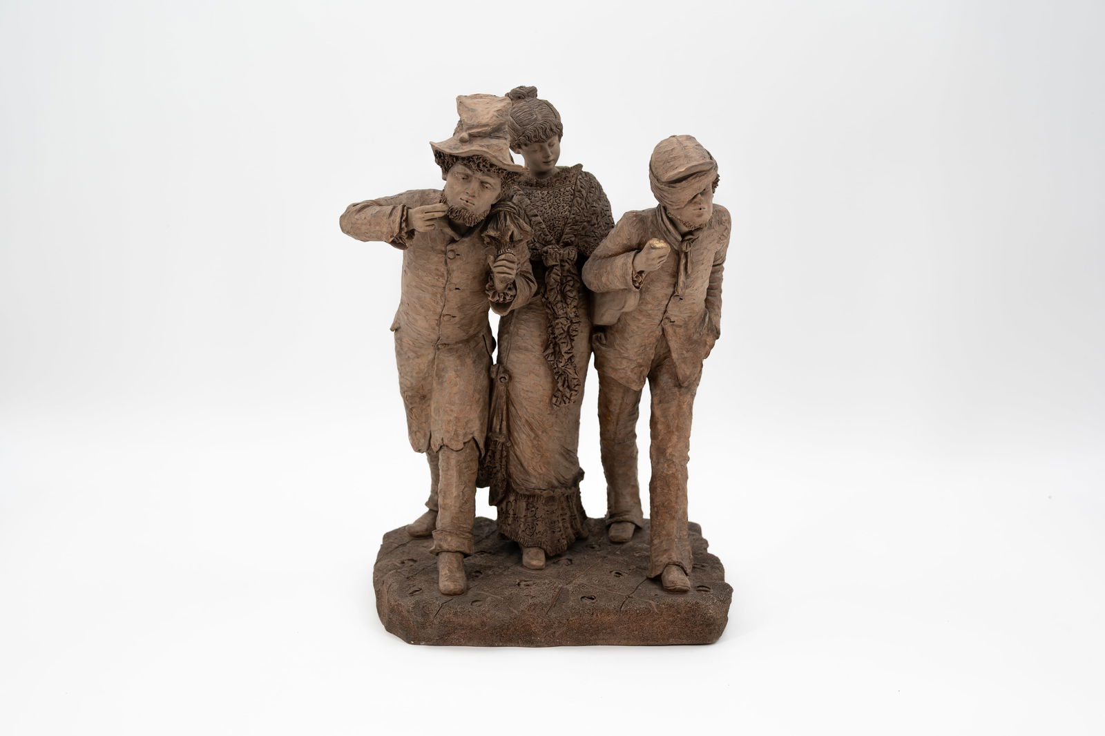 An antique patinated terracotta figural group (1 of 11)