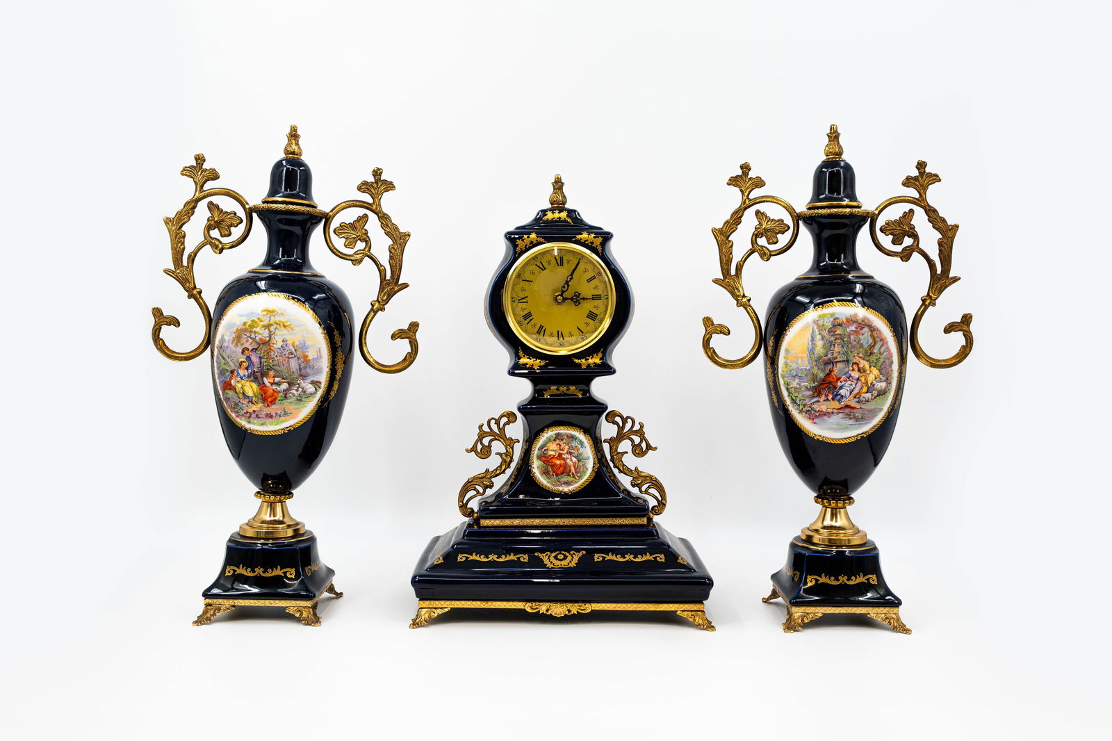 A 20th century French Limoges style brass mounted and cobalt blue decorated mantel clock set (1 of 13)