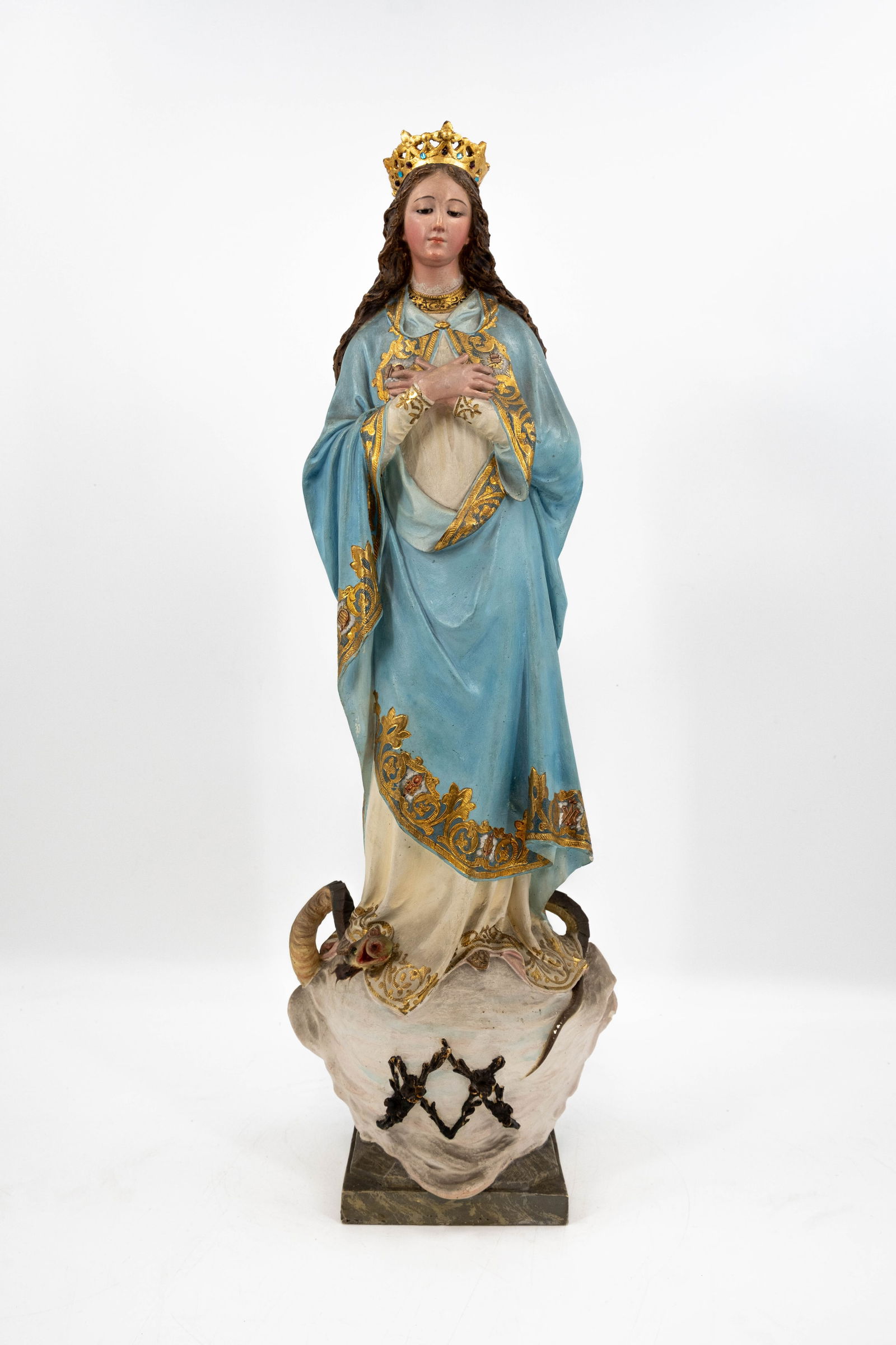 An antique patinated plaster figure of crowned holy virgin stepping on a snake (1 of 13)