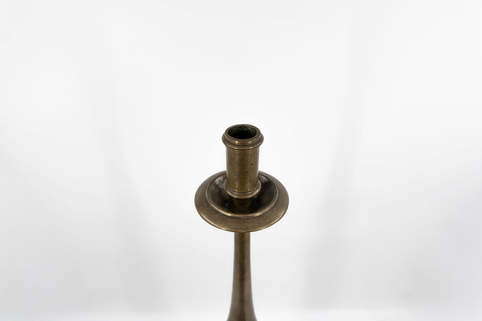 A lot of two large and antique different bronze and brass candle holders - 10