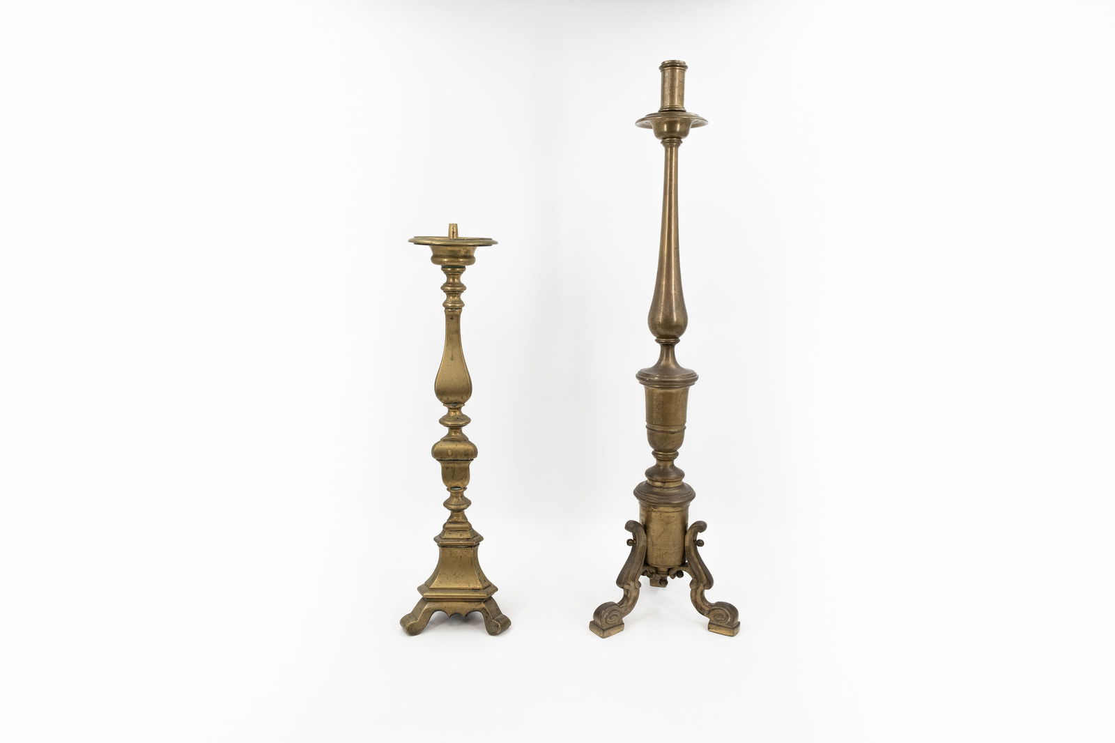 A lot of two large and antique different bronze and brass candle holders (1 of 10)