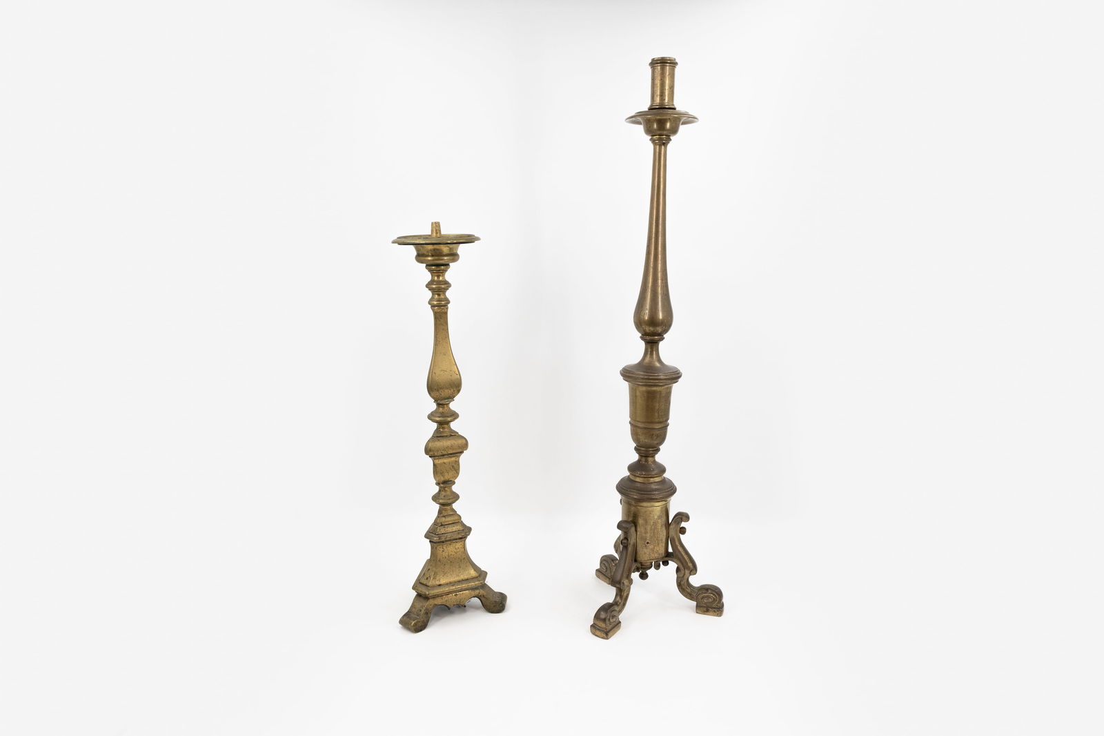 A lot of two large and antique different bronze and brass candle holders - 2