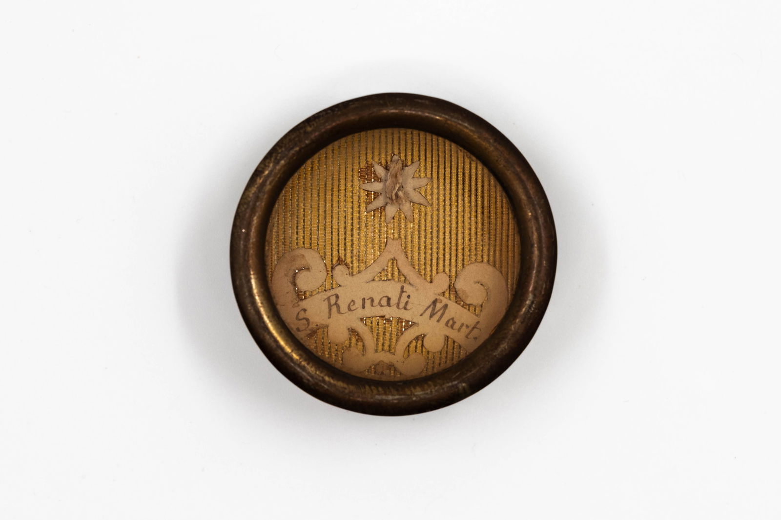 A sealed theca containing a relic of Saint Renatus, with a Certificate of Authenticity: A sealed theca containing a relic of Saint Renatus, Martyr, with a Certificate of Authenticity. S. Renati Mart., Saint Renatus, Martyr The theca and/or accompanying documents are available for