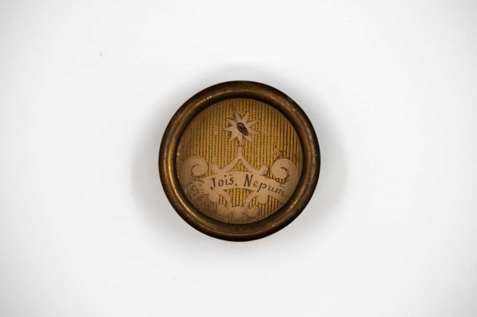 A sealed theca containing a relic of Saint John Nepomucene, with a Certificate of Authenticity (1 of 3)