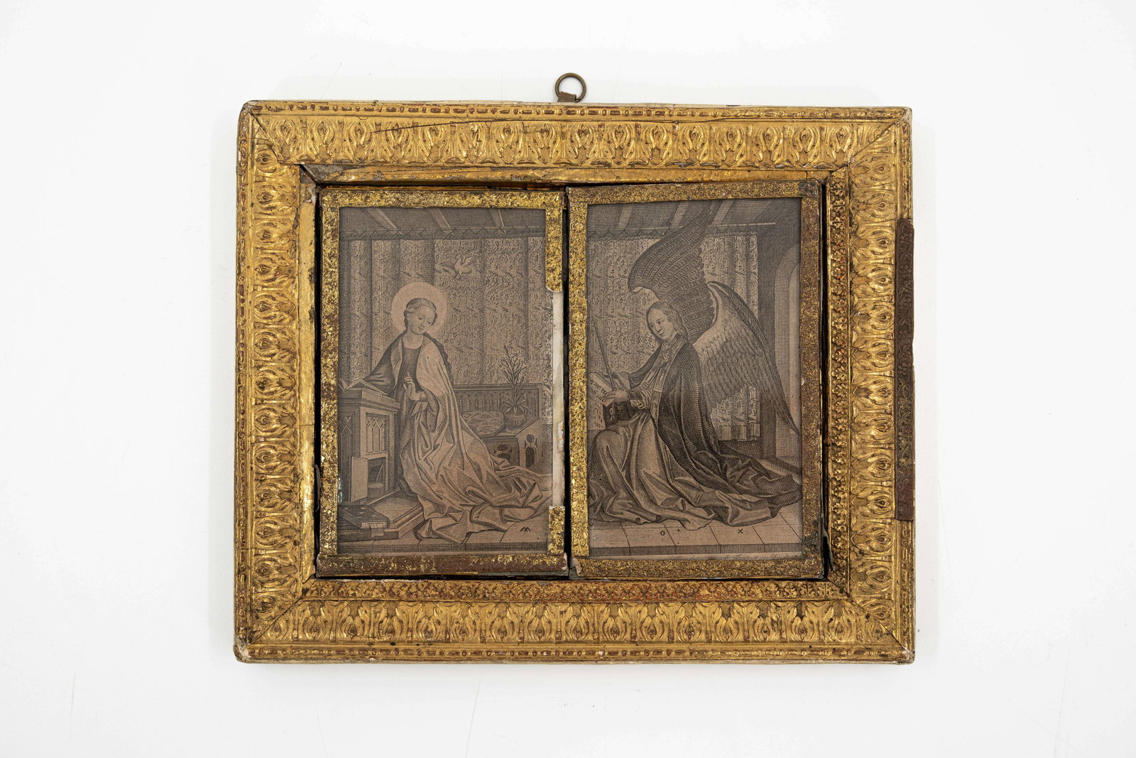 An antique brass framed triptych with religious decorated engravings on paper (1 of 6)