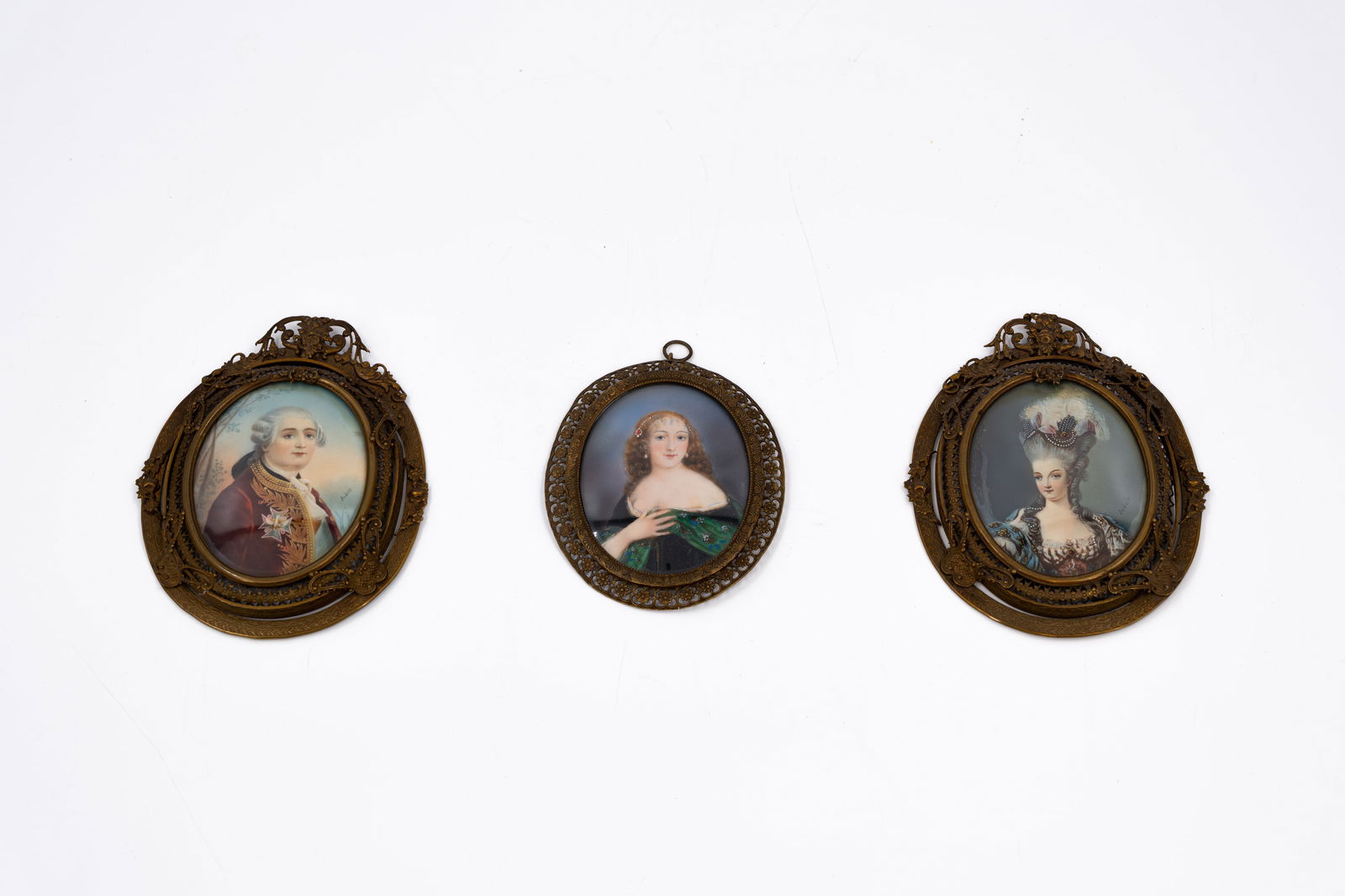 A lot of three antique hand-painted and brass framed portrait wall miniatures (1 of 8)