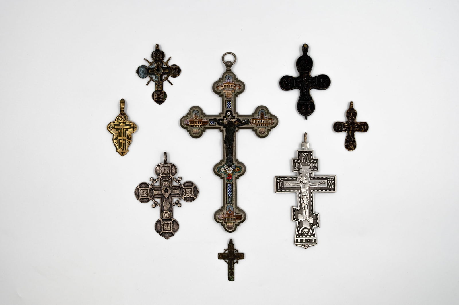 A composed lot of eight Russian silver and other brass crosses (1 of 17)