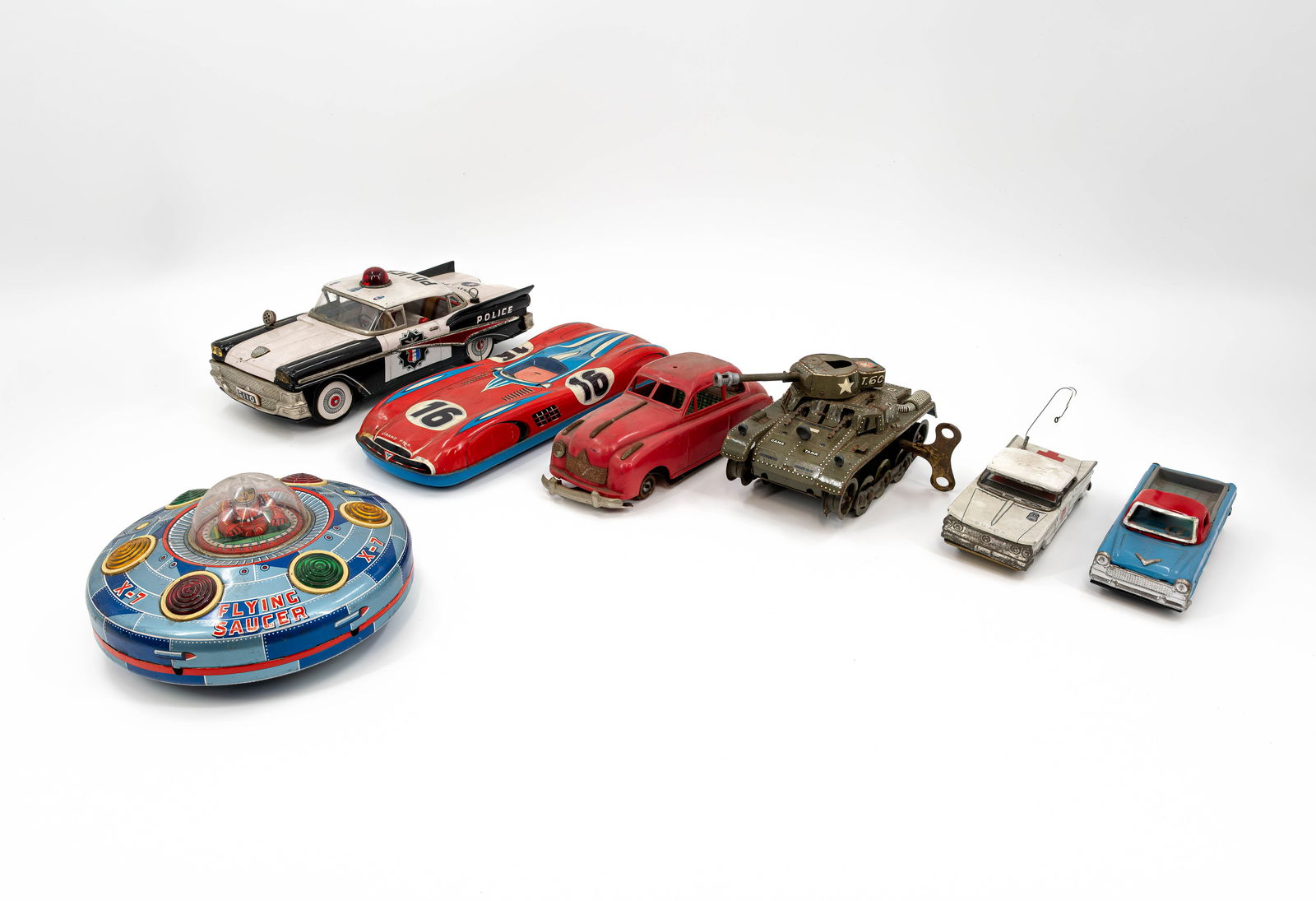 A collection of seven vintage metal toys (1 of 14)
