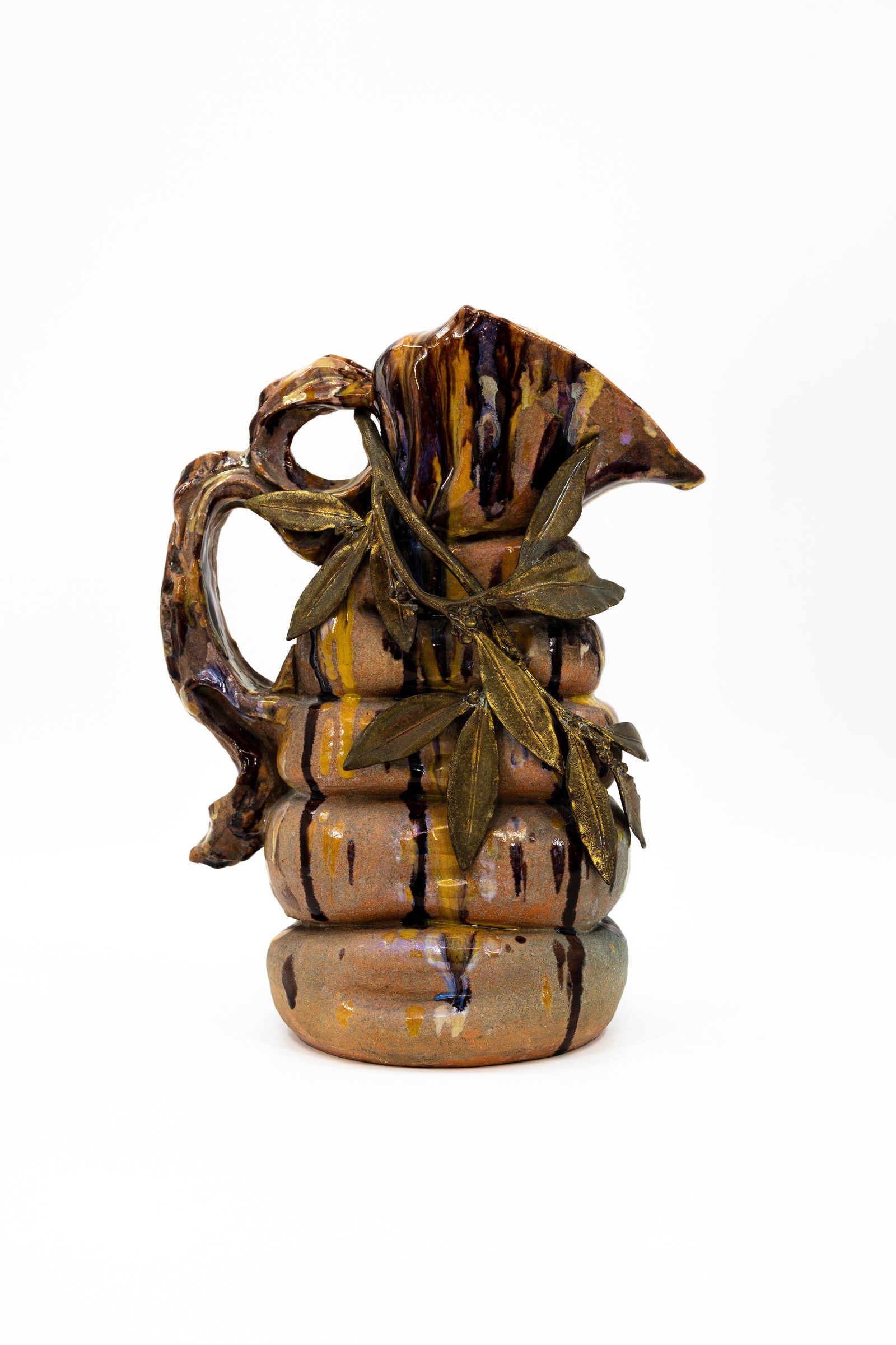An antique French decorated ceramic jug with handle and bronze mounting (1 of 8)