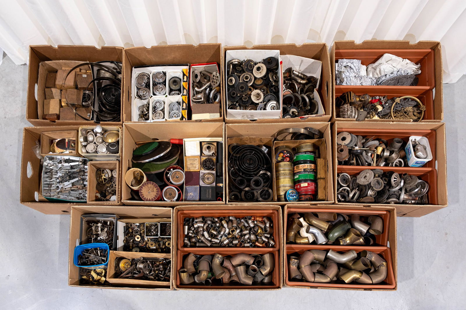 A large lot of 11 boxes of various gramophone and phonograph decoration and mechanic parts for (1 of 12)