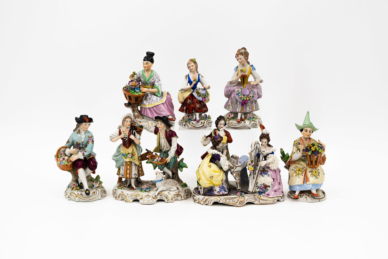 A composed lot of seven German Volkstedt and Sitzendorf Saxony decorated porcelain figurines (1 of 20)