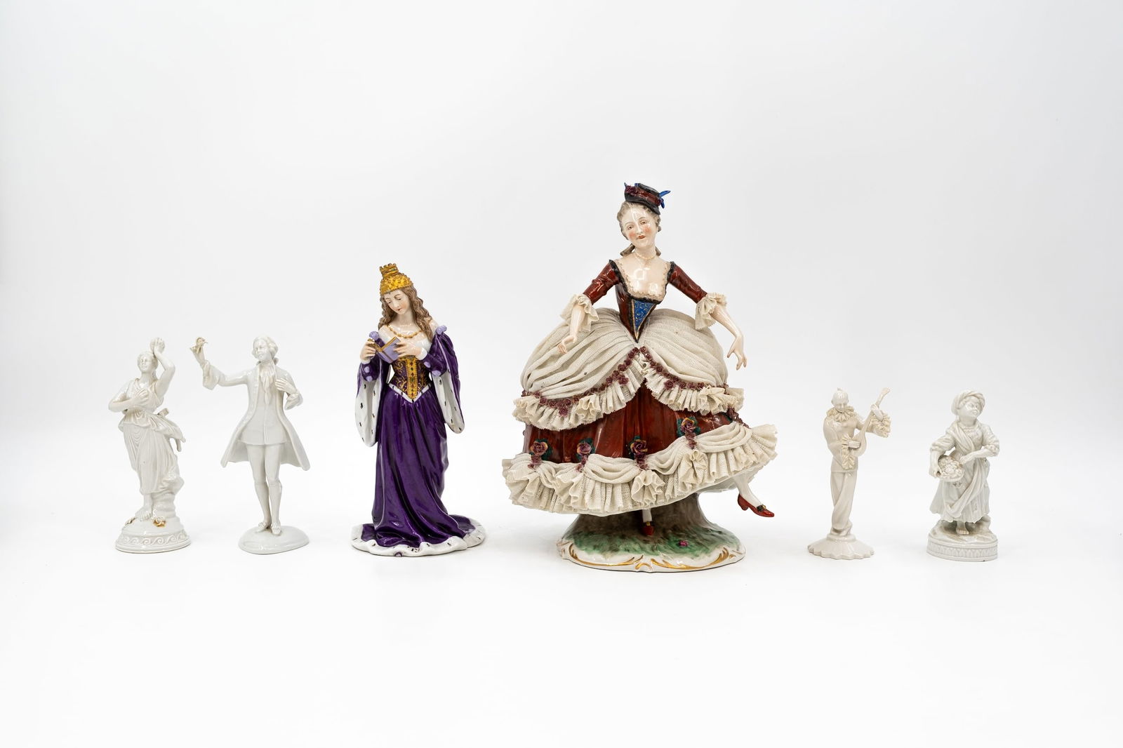 A lot of six German Volkstedt and Napoli decorated porcelain figurines (1 of 19)