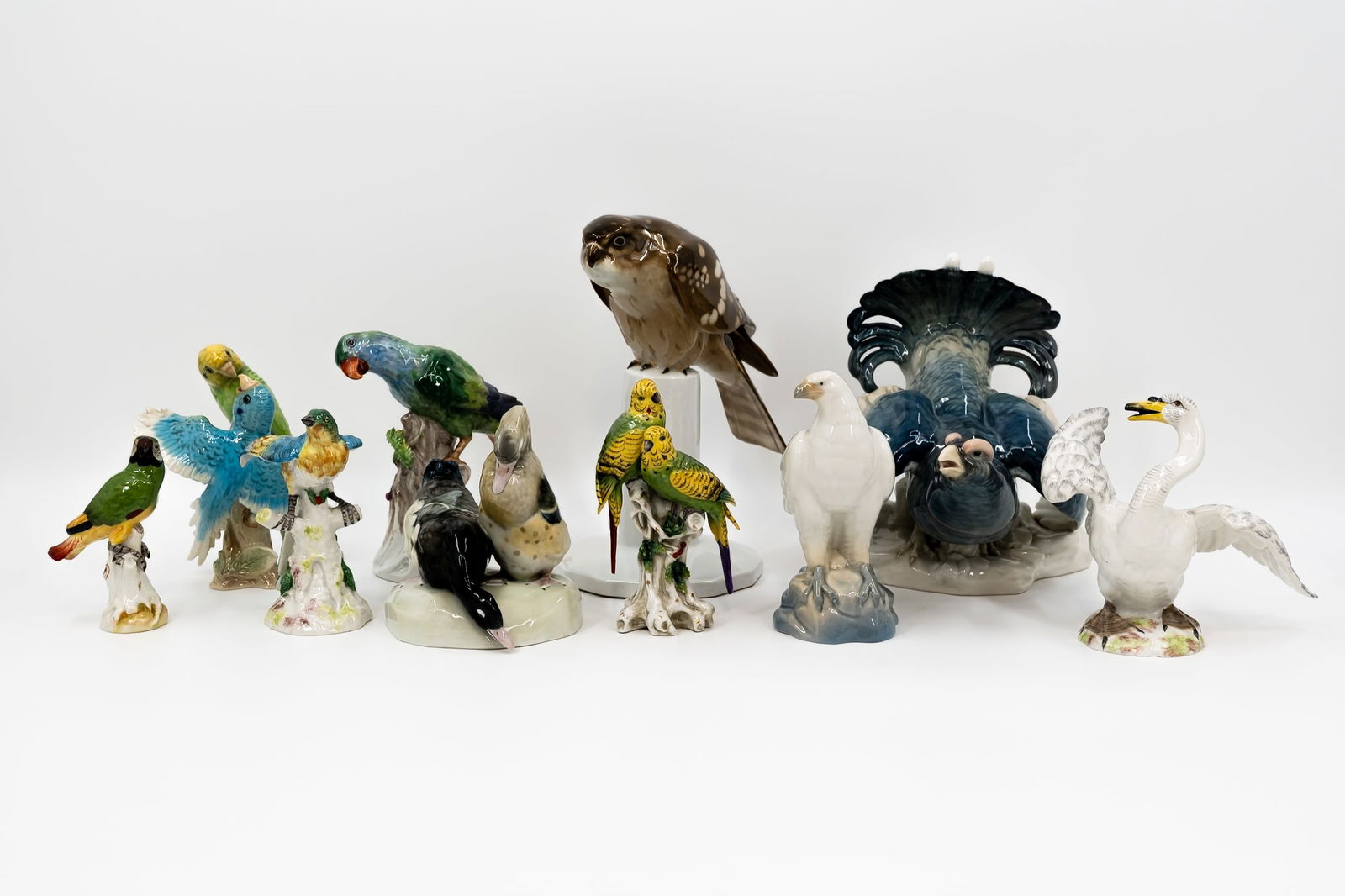 A composed lot of 7 various marked porcelain birds (1 of 15)
