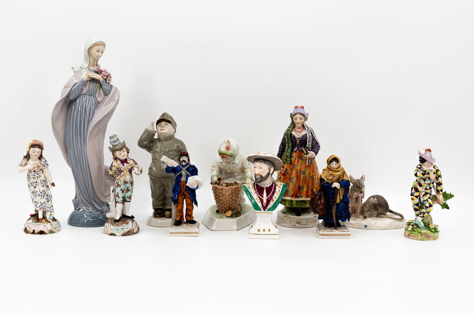 A composed lot of 11 variously marked porcelain figurines (1 of 19)