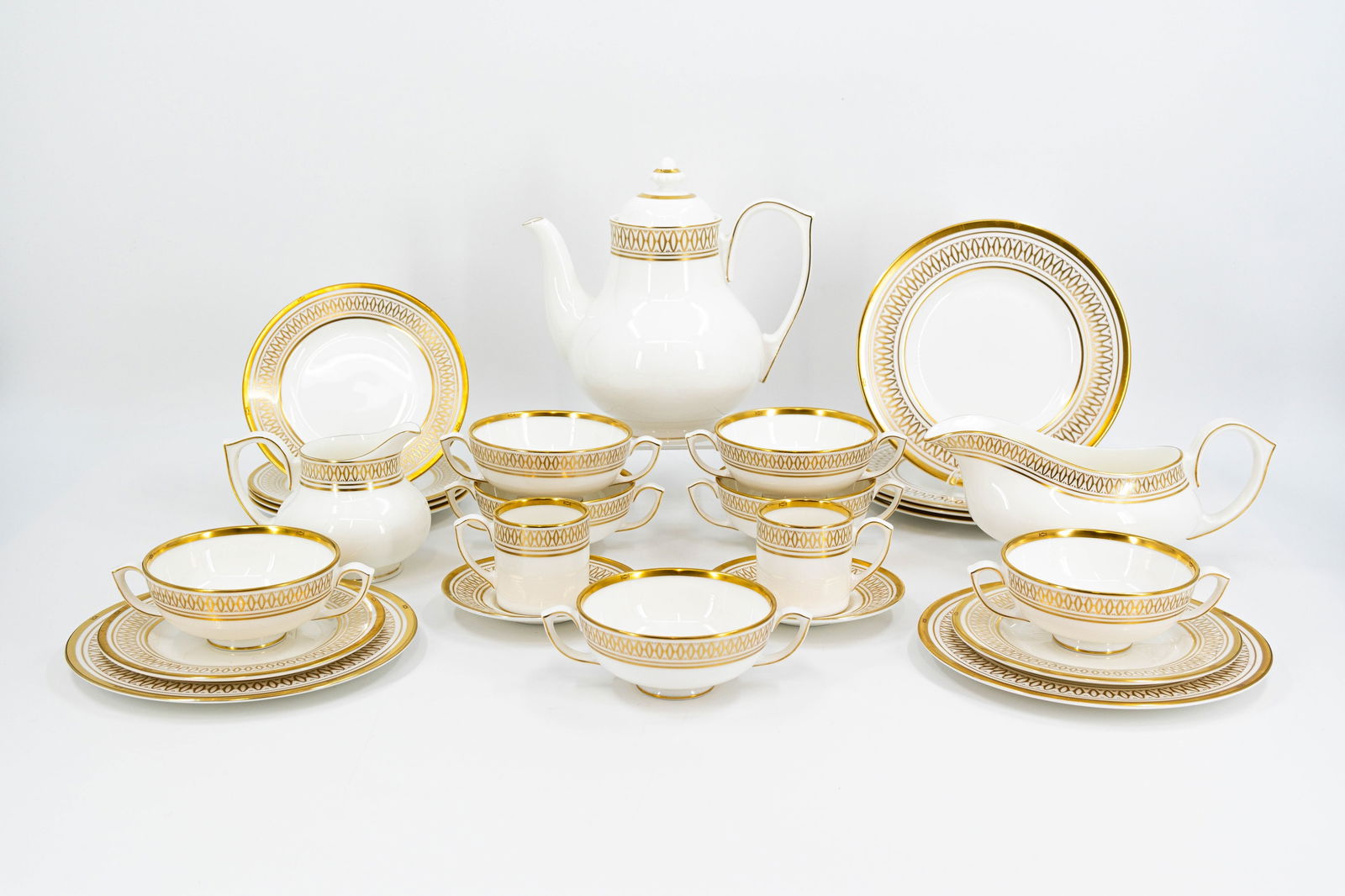 A twenty-six part French CARTIER "La Maison Des Must" gilt decorated porcelain tableware set (1 of 18)