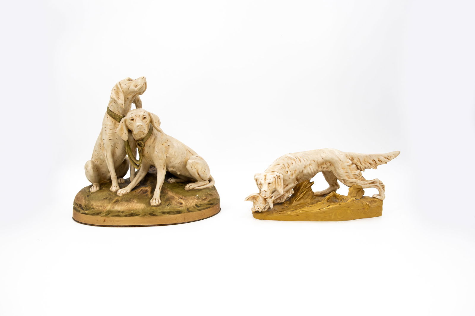 A lot of two Bohemian glazed porcelain Royal Dux figures of hunting dogs (1 of 9)