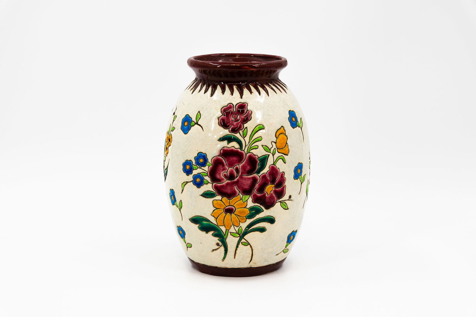 A Belgian art deco BOCH KERAMIS florally decorated vase in glazed ceramic: A Belgian art deco BOCH KERAMIS florally decorated vase in glazed ceramic. Marked and model number: D2701. First half 20th century. H: 24 cm