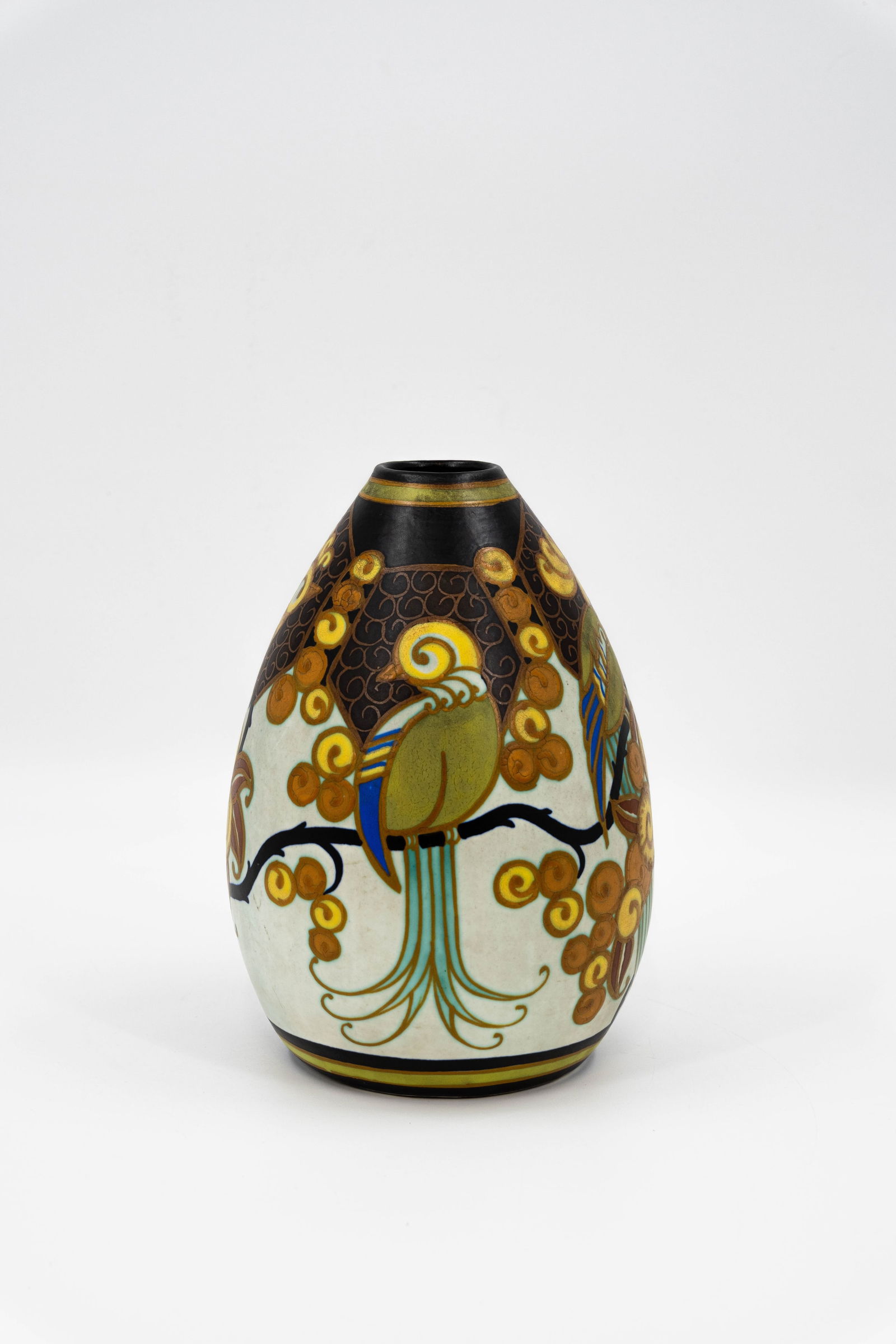 A Belgian BOCH KERAMIS Art Deco "birds of paradise" decorated ceramic vase: A Belgian BOCH KERAMIS Art Deco "birds of paradise" decorated ceramic vase designed by Charles CATTEAU (1880-1966). Marked and model number: D1130. First half 20th century. H: 23 cm