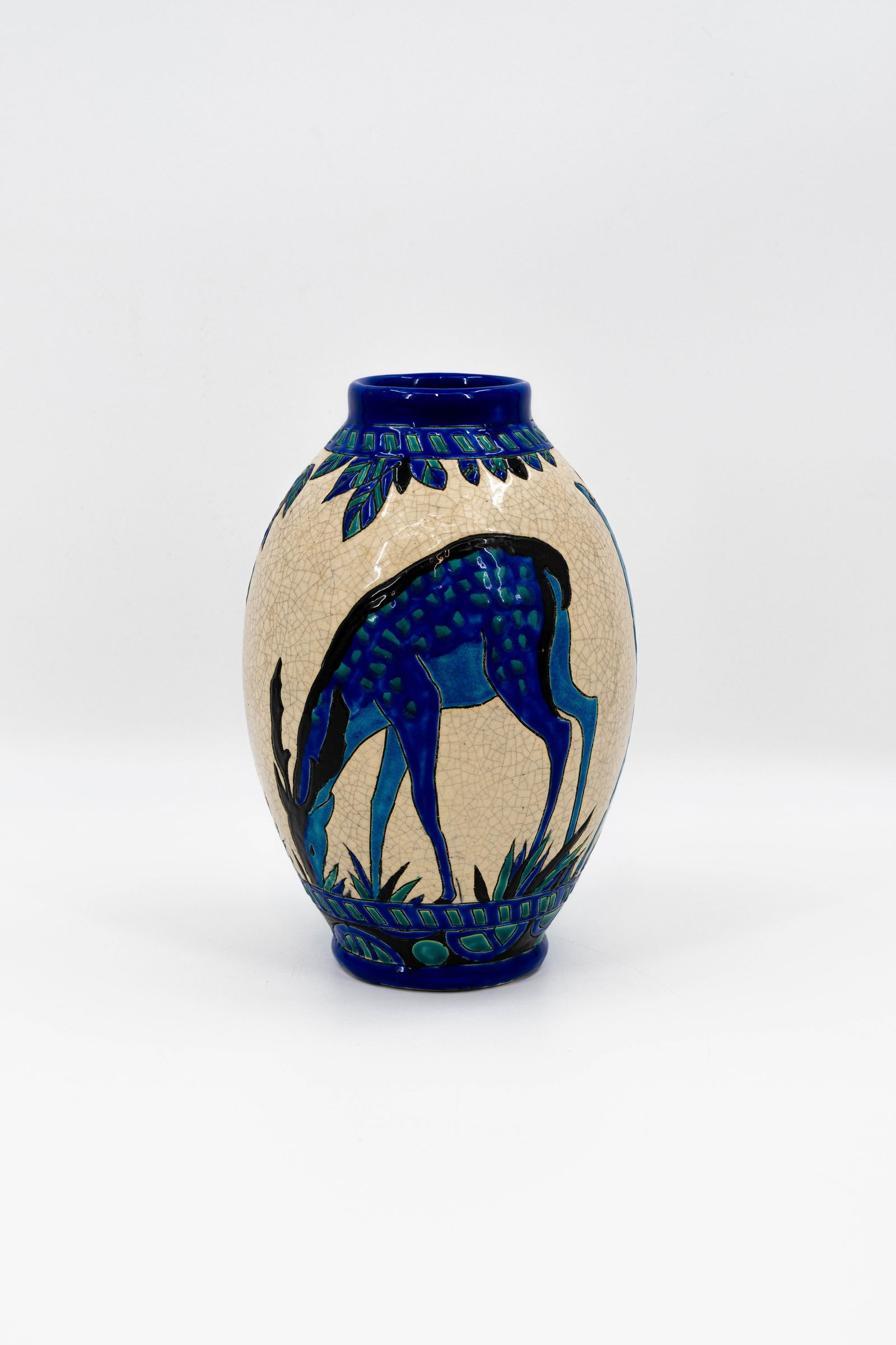 A Belgian BOCH KERAMIS Art Deco glazed and deer decorated ceramic vase: A Belgian BOCH KERAMIS Art Deco glazed and deer decorated ceramic vase by Charles CATTEAU (1880-1966). Model number: 668. First half 20th century. H: 27 cm
