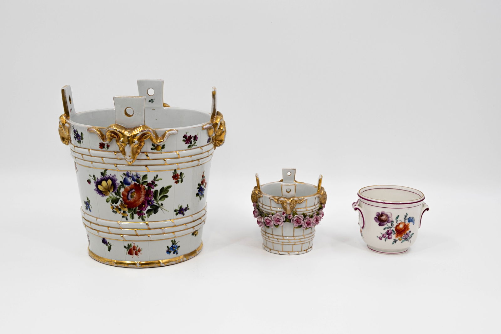 A lot of three German antique flora decorated porcelain cache pots (1 of 12)