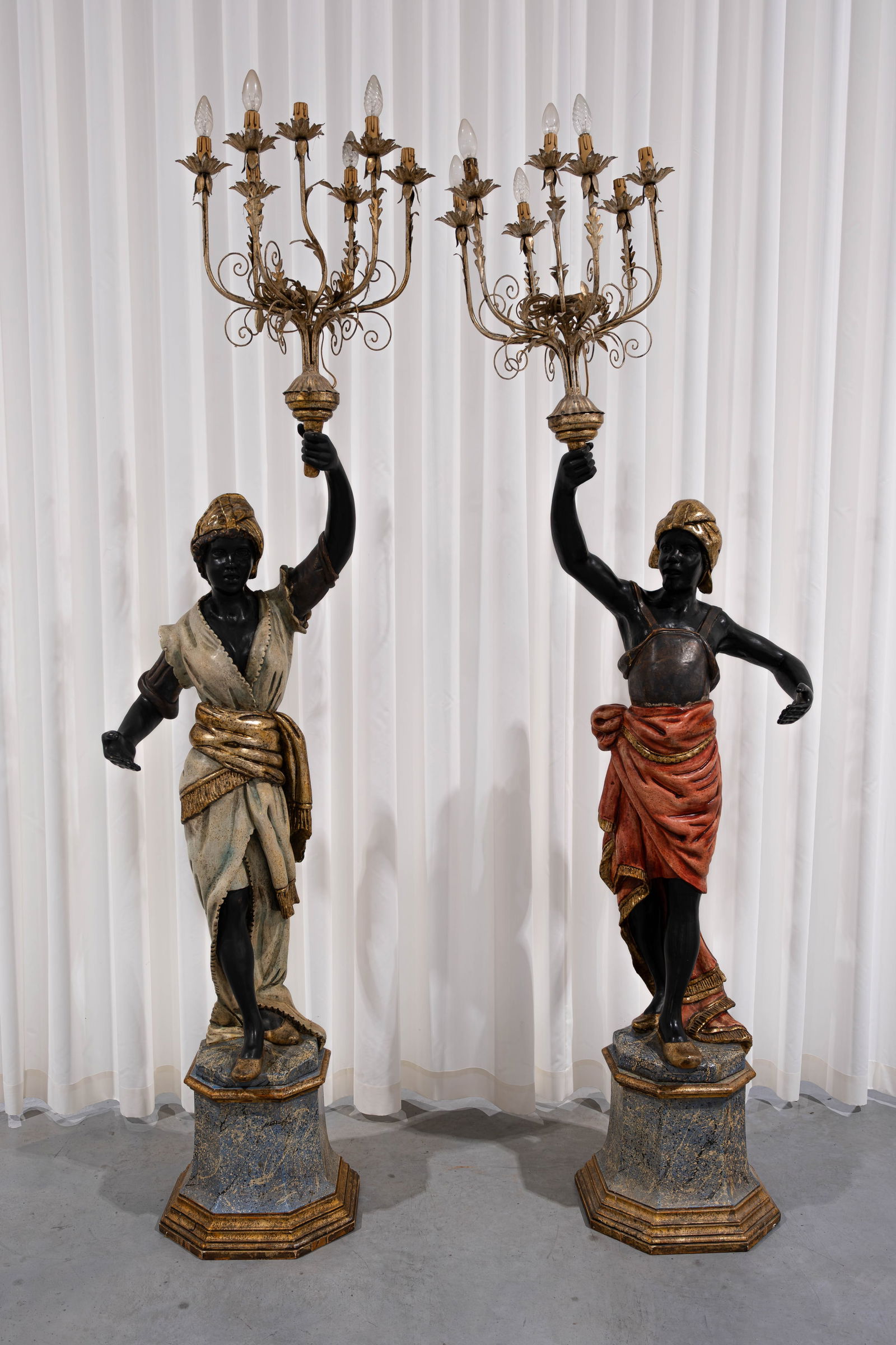 A pair of large vintage Venetian polychrome patinated carved wooden figural sculptures with metal (1 of 11)