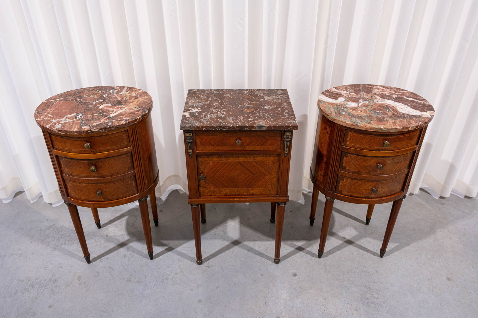 A lot of three Louis XV style veneer and brass mounted side cabinets with drawers and marble tops (1 of 6)
