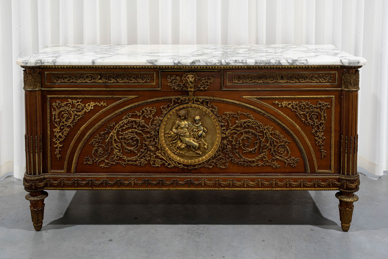 A 20th century Louis XVI style richly decorated commode with marble top and brass mountings (1 of 13)