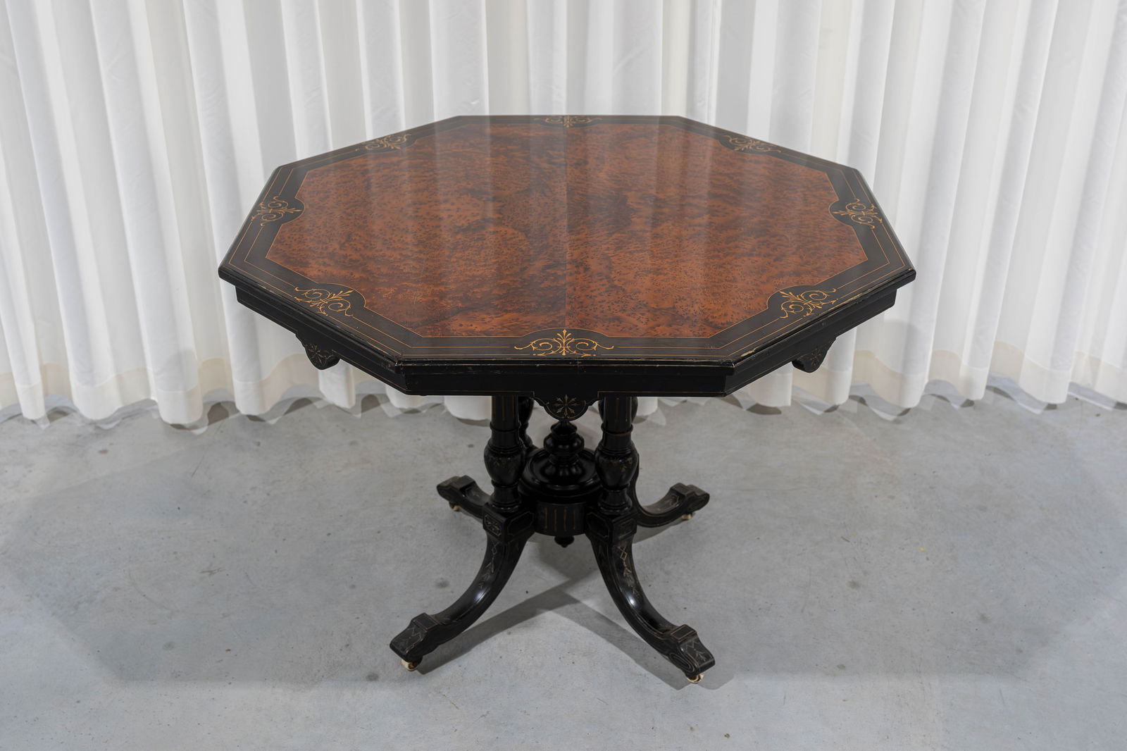 An antique octagonal Napoleon III style veneer and blackened wood side table (1 of 5)