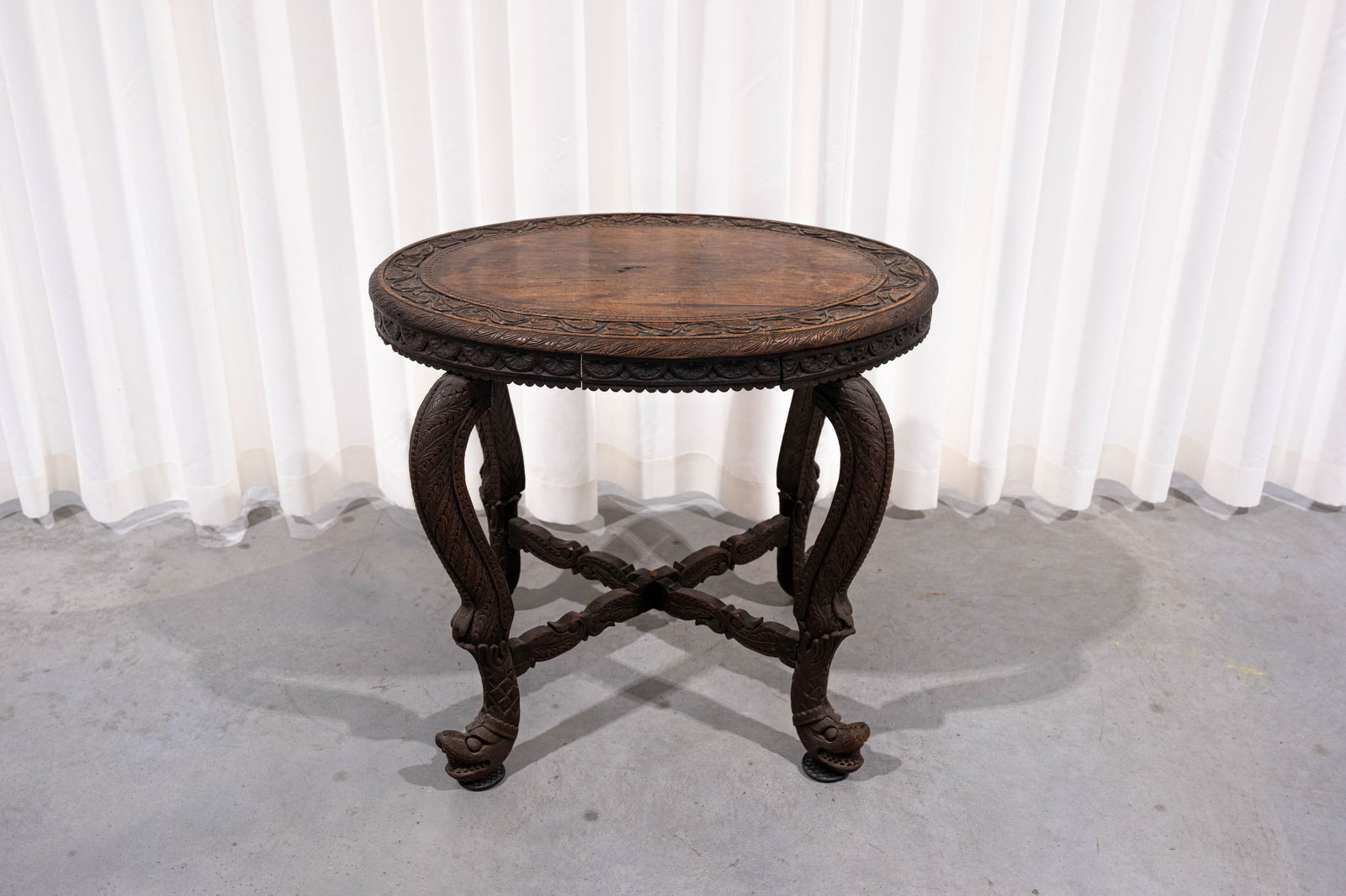 A small and antique Anglo-Indian Burmese carved exotic wood oval side table (1 of 8)