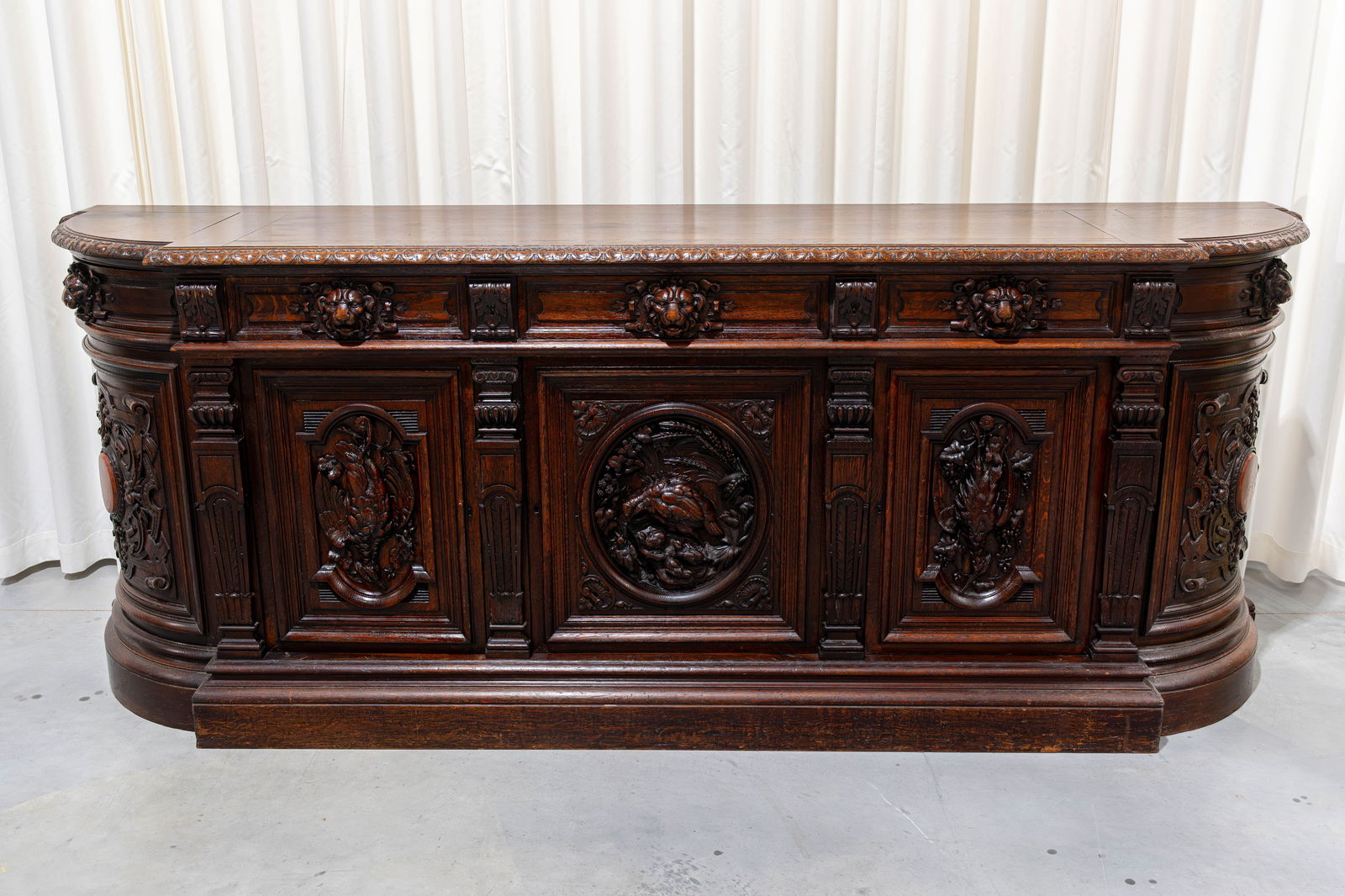 A large and antique French hunt decorated carved oak five doors sideboard cabinet (1 of 11)