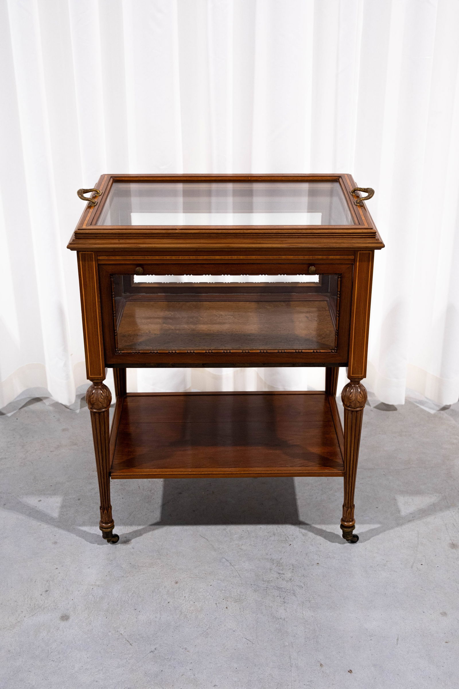 An antique tea serving cabinet with tray on wheels (1 of 9)