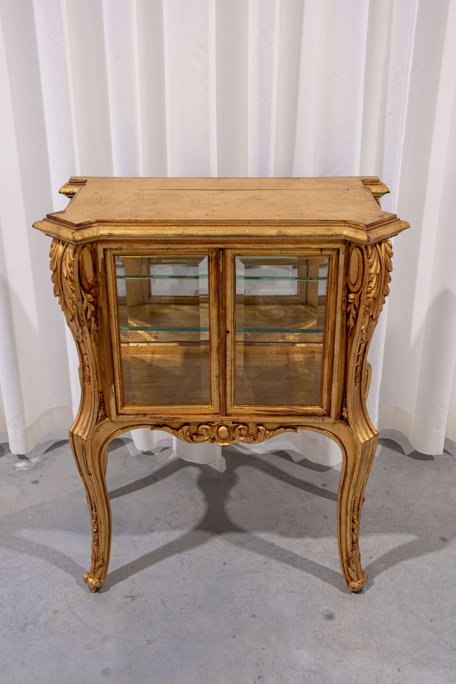 A small and 20th century gilt carved wood display cabinet (1 of 5)