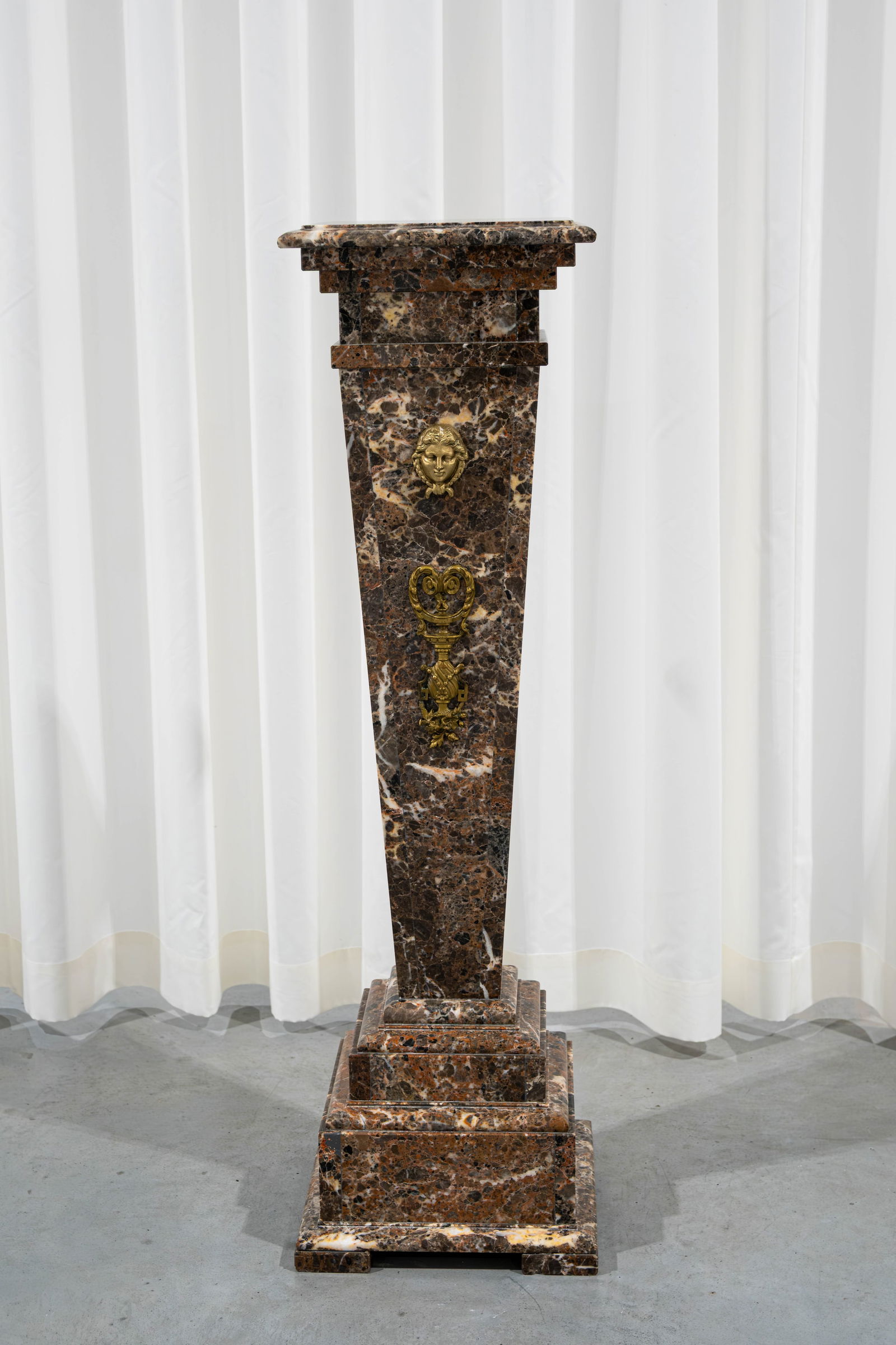 A brown and white flamed square marble column pedestal with brass mounted ornament (1 of 6)