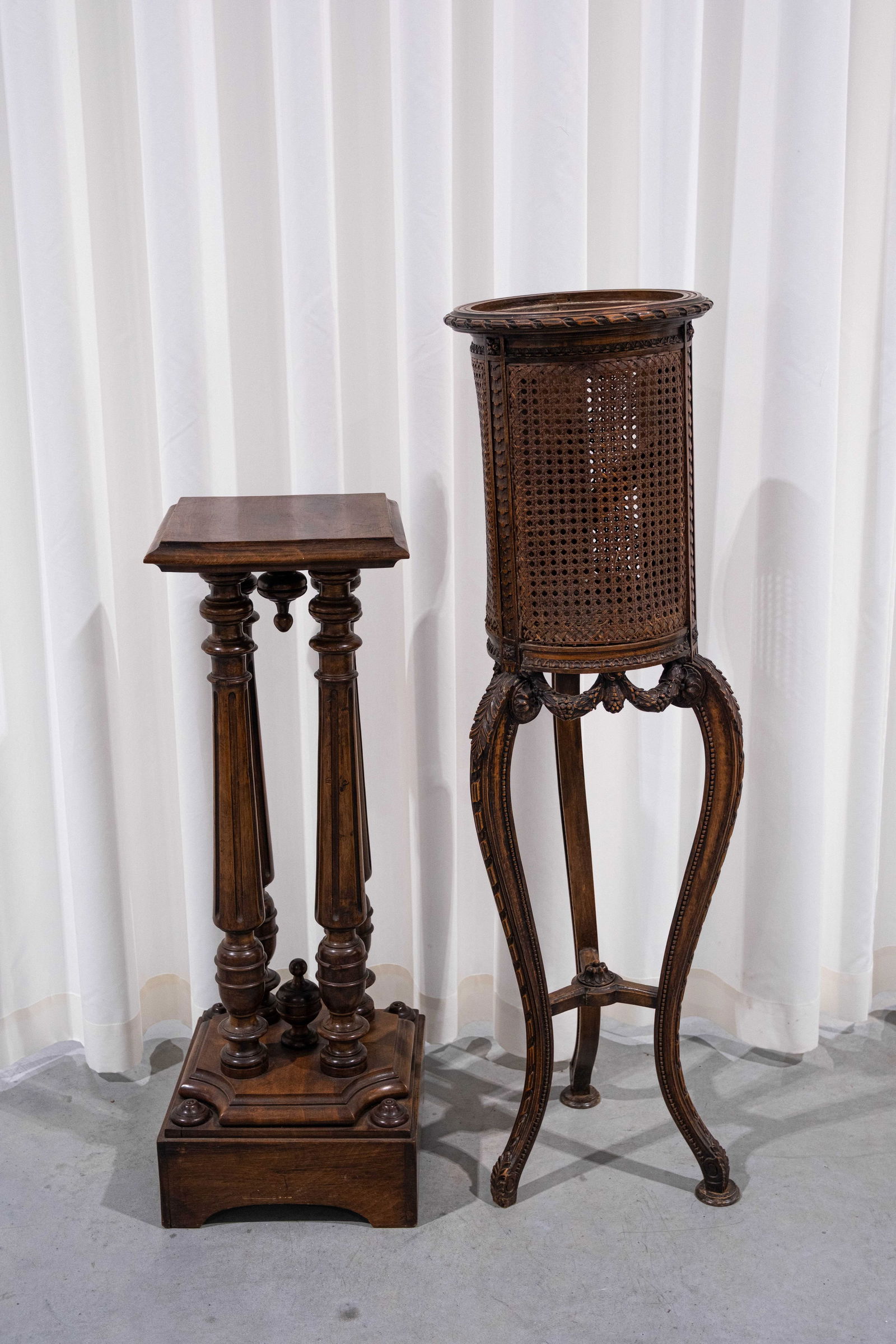 An antique oak wooden pedestal supported by columns together with and planter basket on foot (1 of 12)