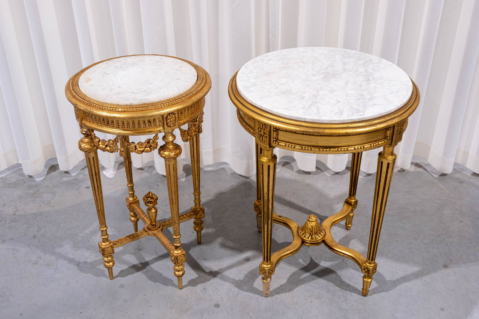 A lot of two Louis XV style gilt carved wood decorated side tables with white marble tops (1 of 10)