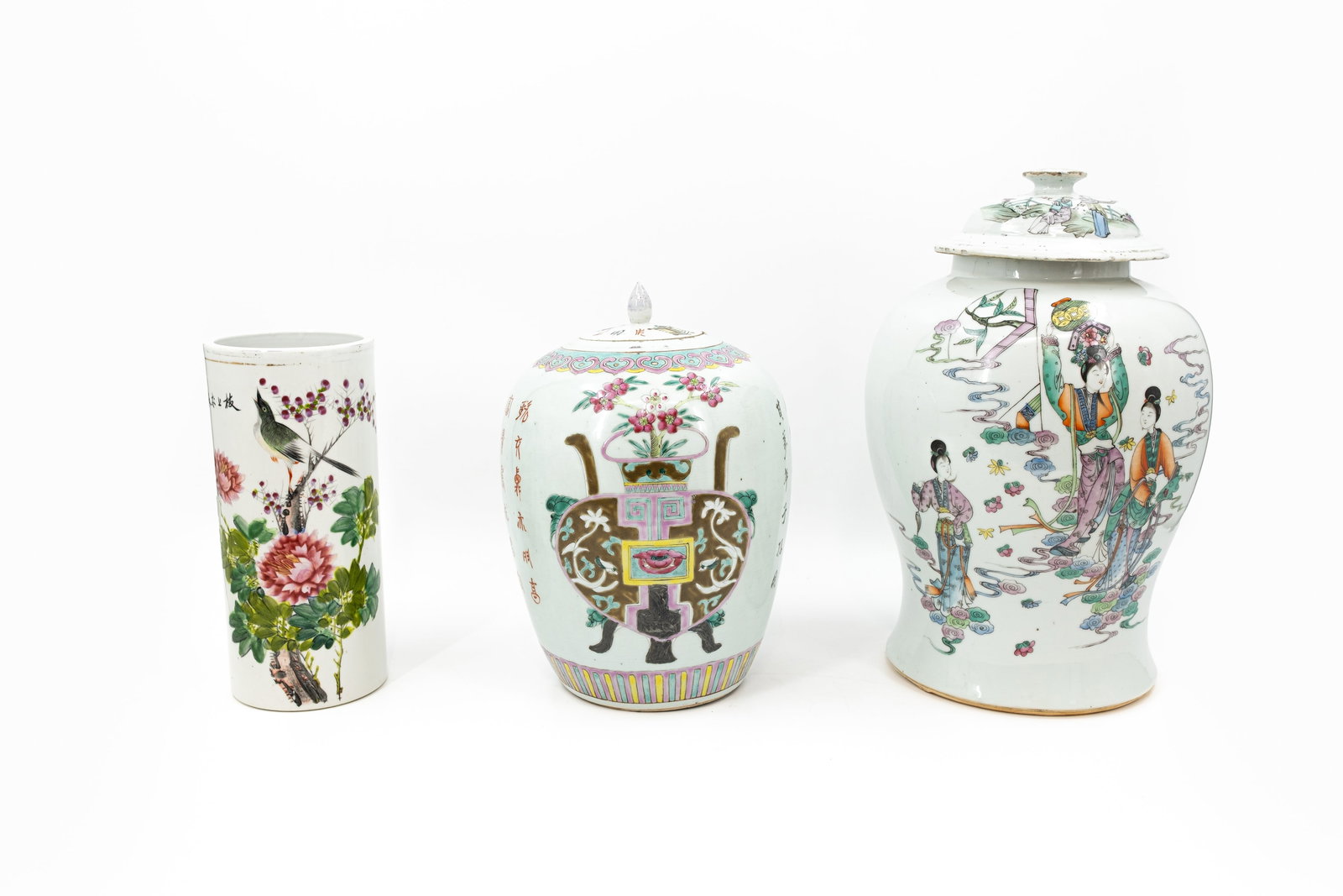 A composed lot of three Chinese various shaped and decorated Qianjiang Famille rose porcelain vases (1 of 14)