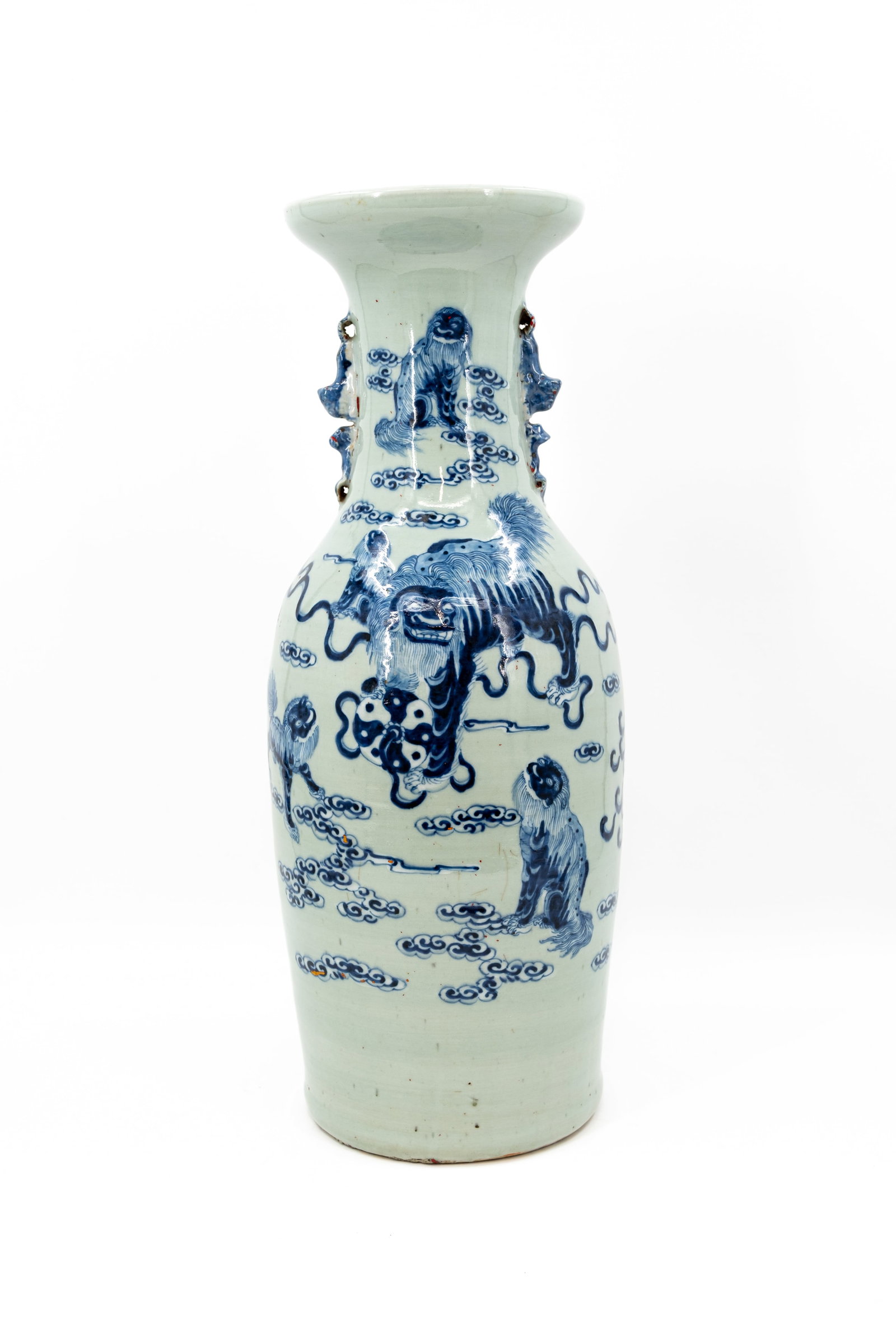 A Chinese blue and white decorated porcelain vase with scene of Buddhist lions: A Chinese blue and white decorated porcelain vase with scene of Buddhist lions. 19th/20th century. Condition: bottom crack, otherwise excellent. Report available on request. H: 60 cm