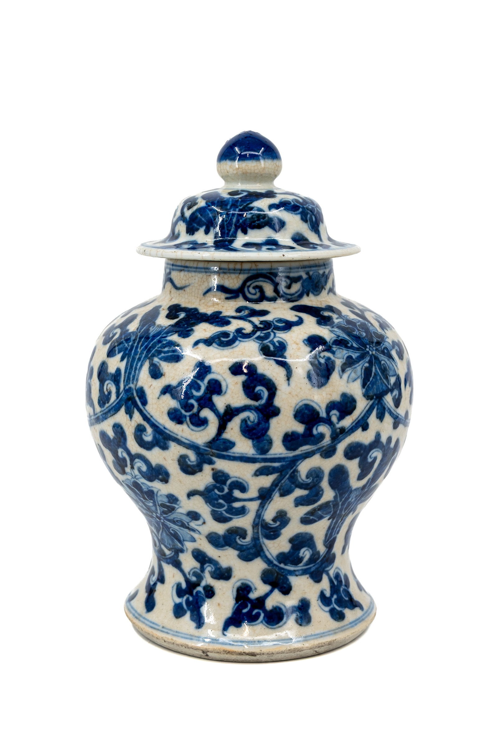A Chinese blue and white florally decorated nankin covered porcelain vase (1 of 10)