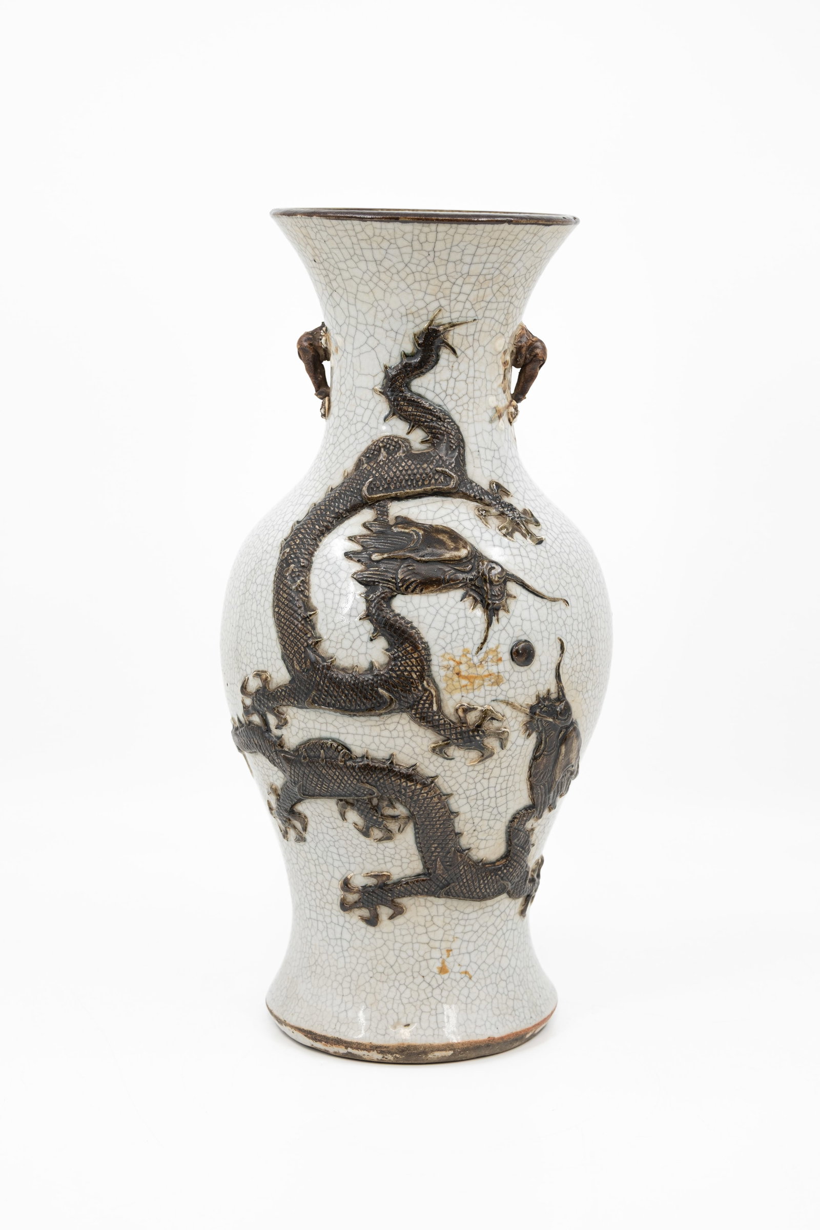A Chinese dragon reliëf decorated crackled glazed vase with a dragon decor (1 of 12)