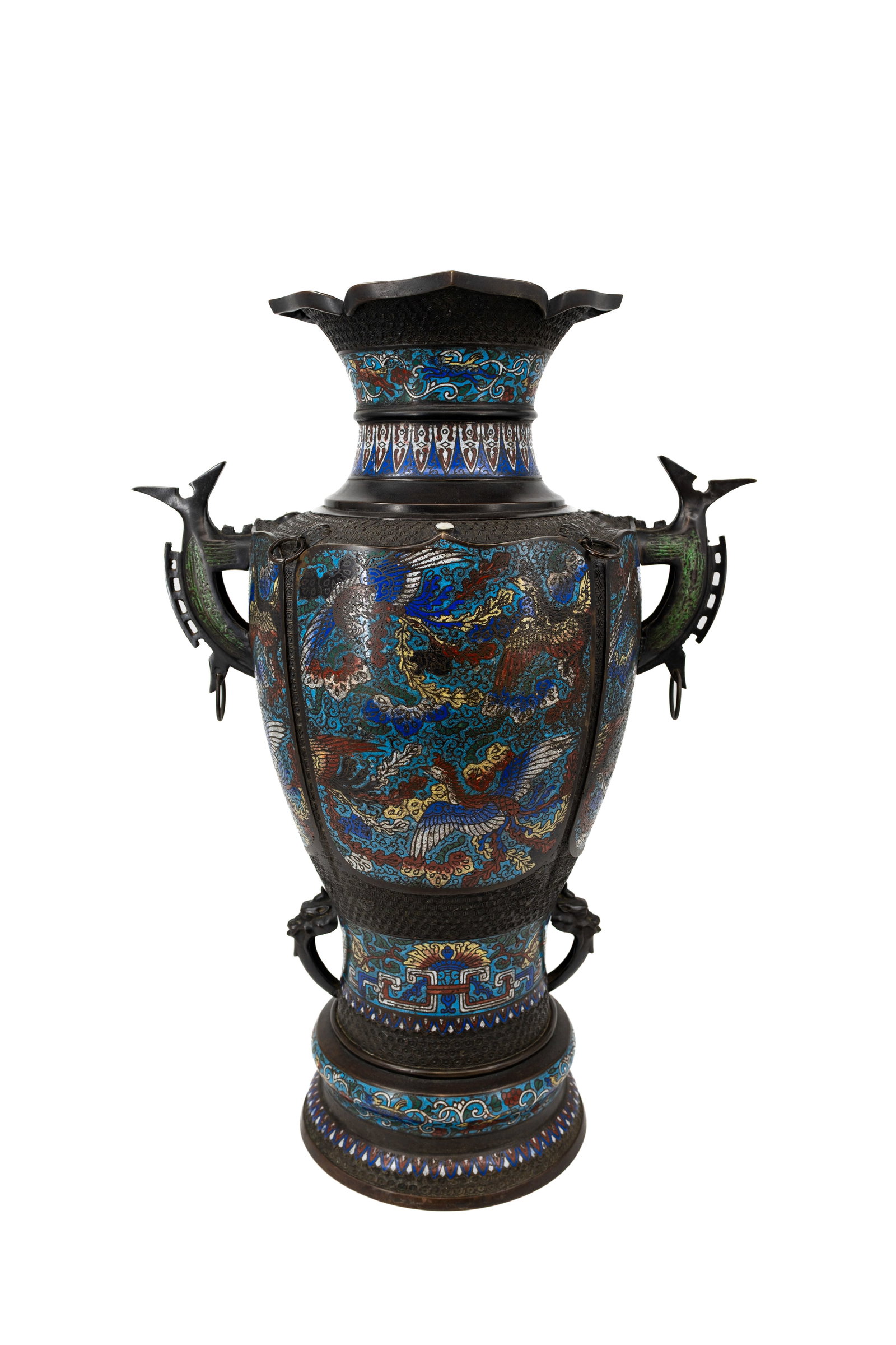 A large Oriëntal decorated champlevé and patinated bronze vase with handles: A large Oriëntal decorated champlevé and patinated bronze vase with handles. 19th/20th century. H: 75 cm