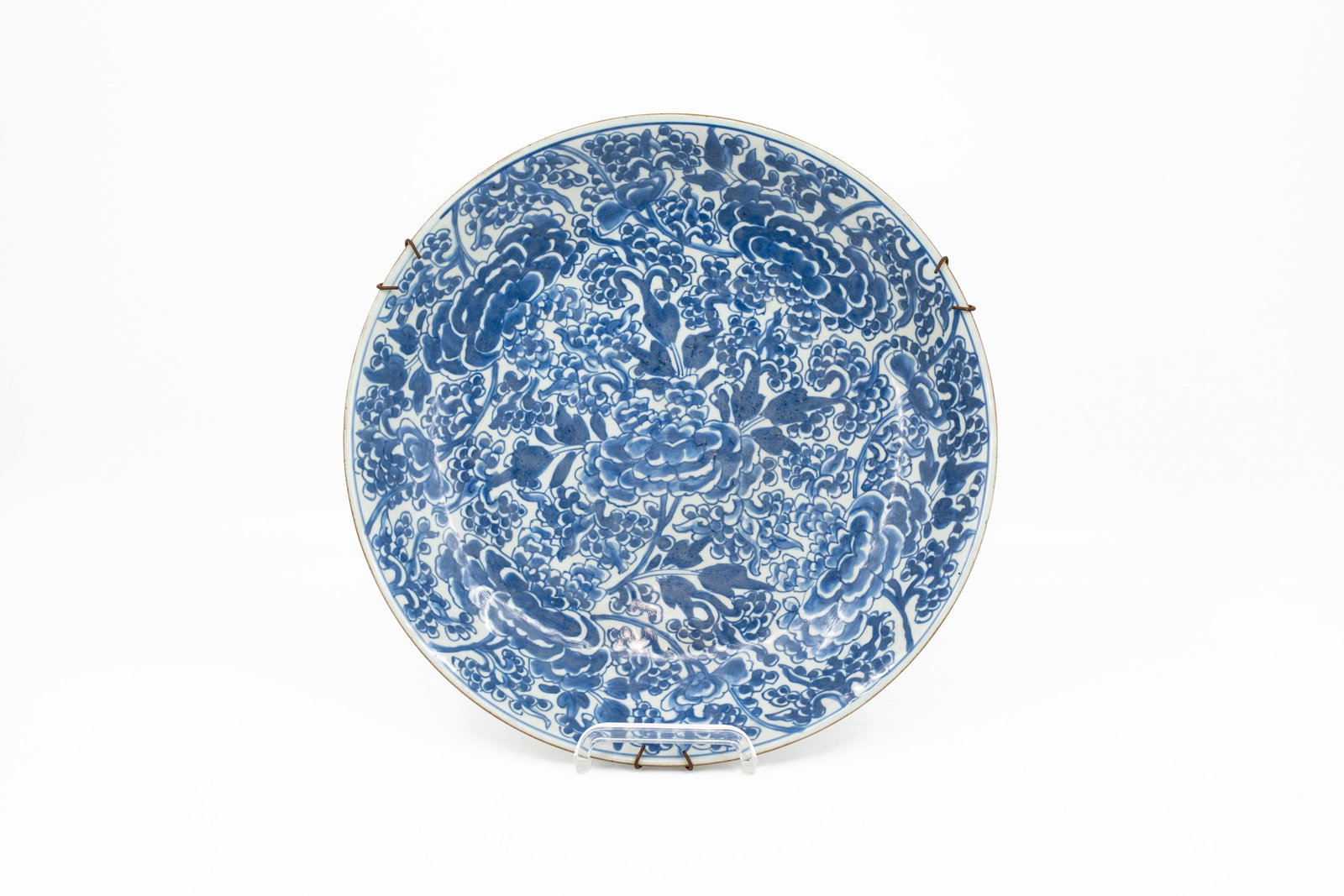 A large Chinese blue and white floral decorated porcelain dish (1 of 7)