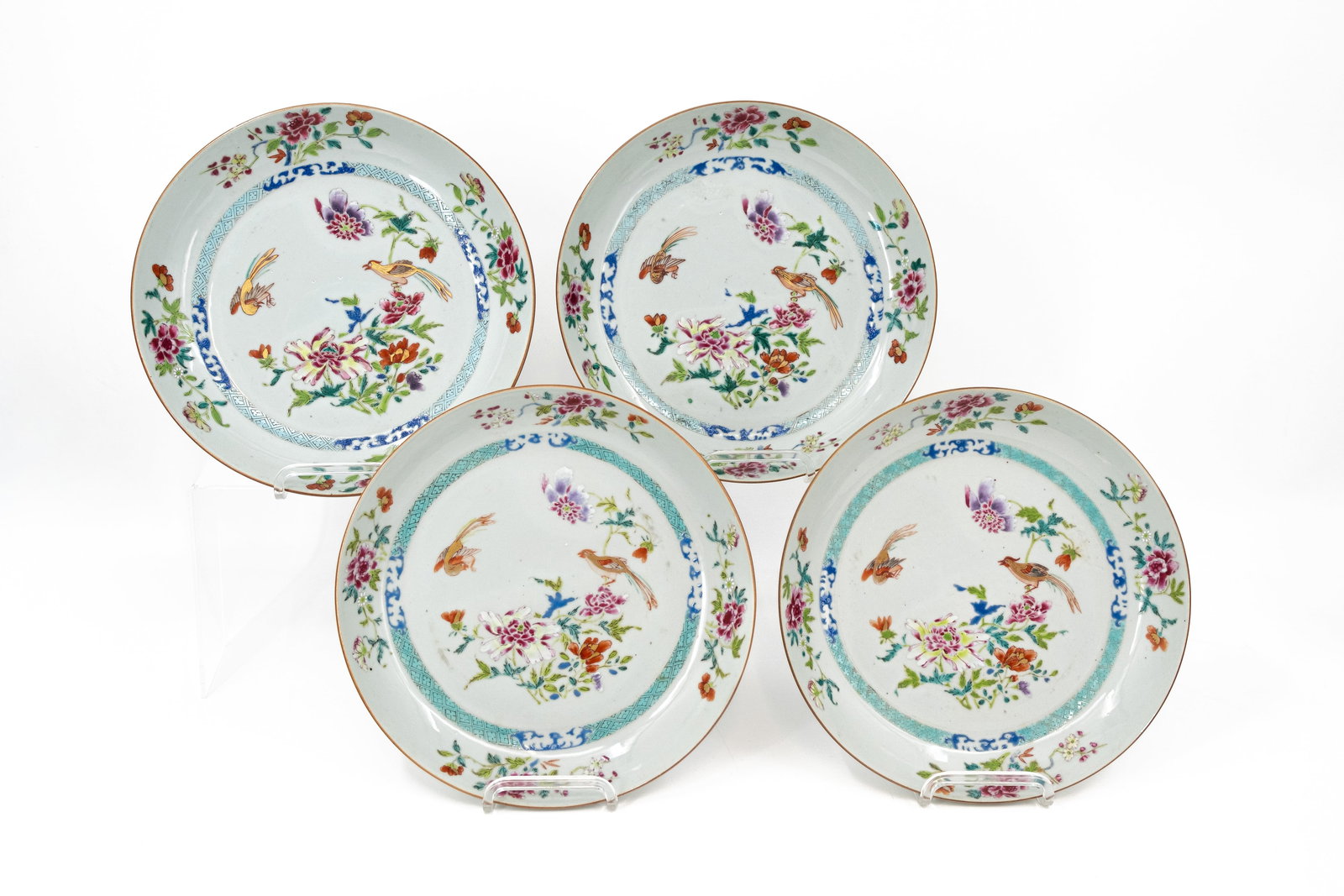 A lot of four matching Chinese Famille rose floral and bird decorated porcelain dishes (1 of 10)