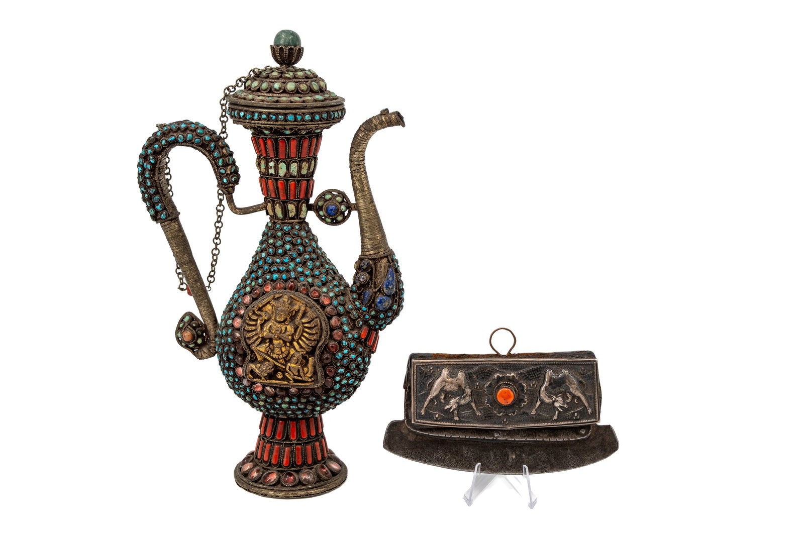 A Tibetan turquoise and coral mounted coffee pot and a decorated fire flint striker: A Tibetan turquoise and coral mounted coffee pot and a decorated fire flint striker. 19th/20th century. H: 8,5 - 25,5 cm