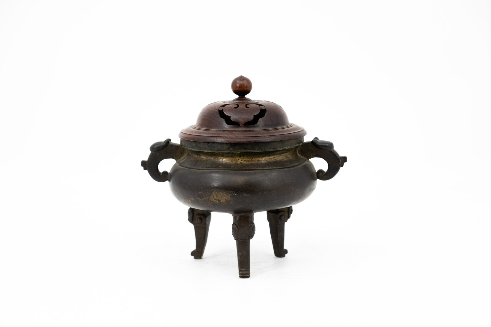 A Chinese partly gilt cast bronze and wooden covered tripod incence burner (1 of 8)